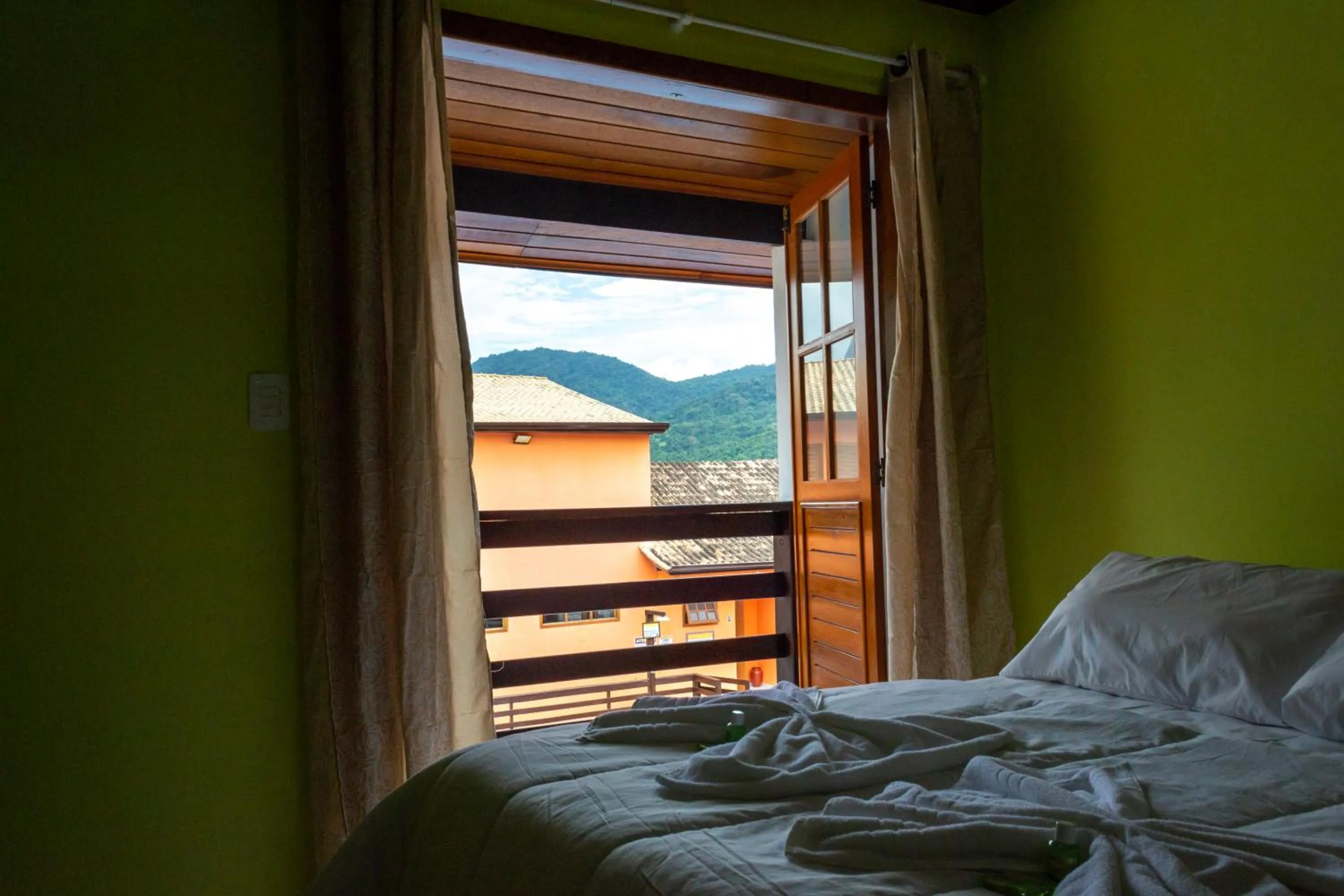 Bed in Pousada Estrada do Ouro