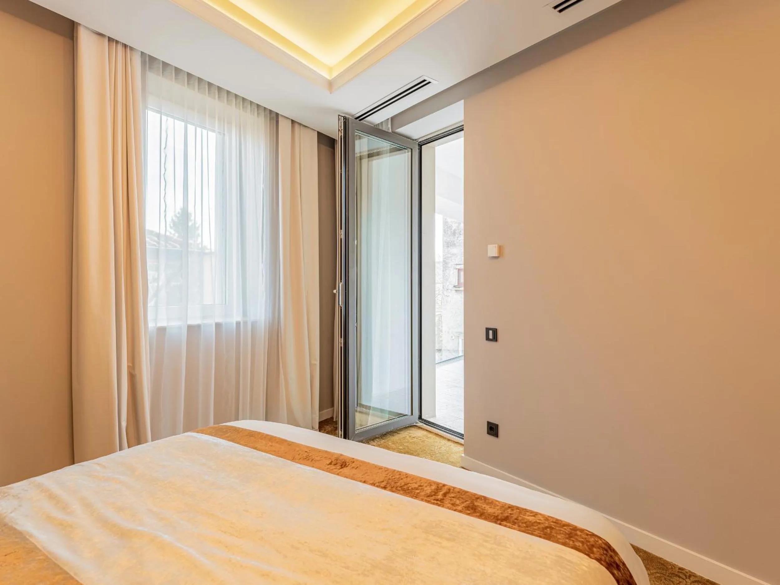 Bed in Pergola Boutique Hotel