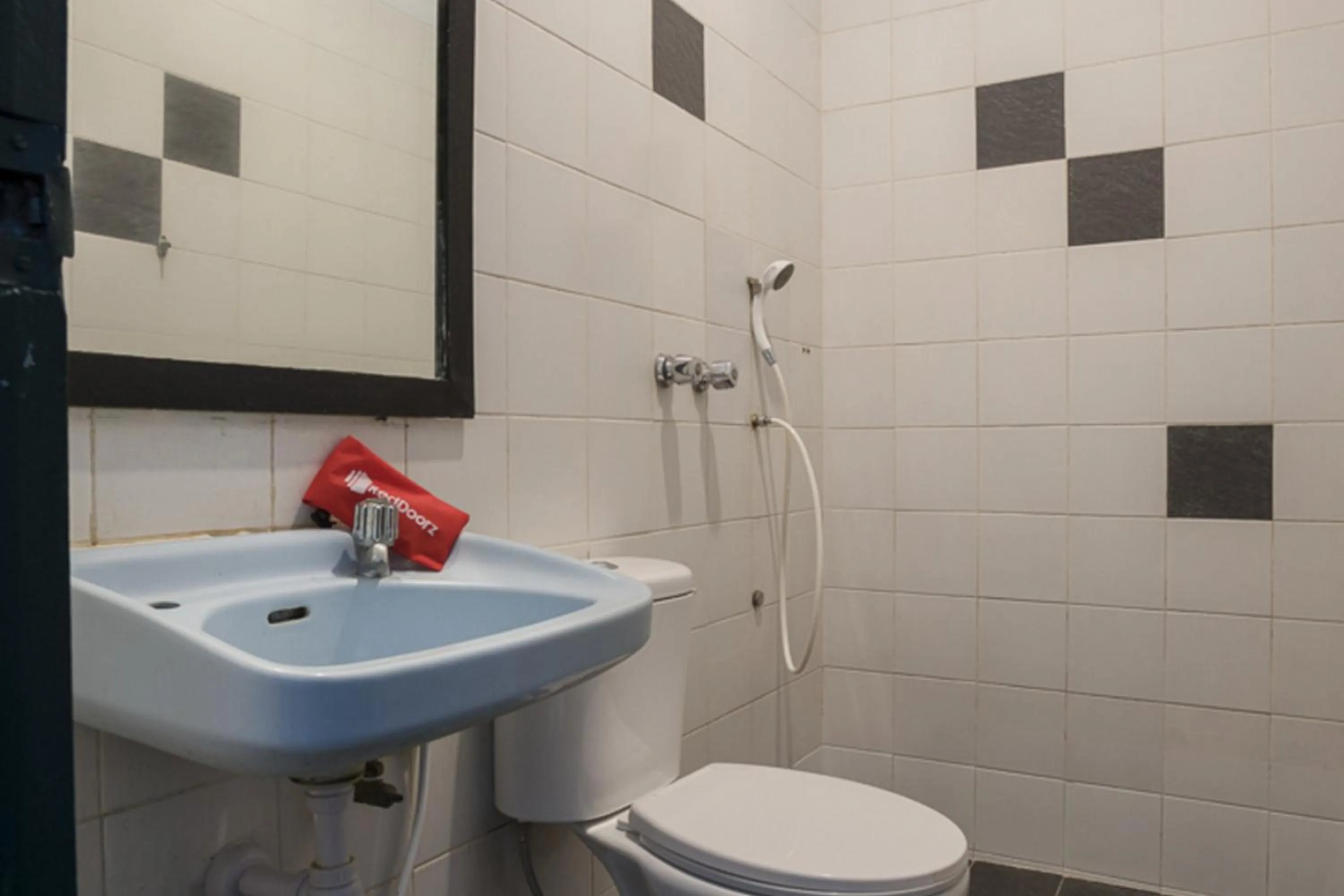 Bathroom in RedDoorz Plus near Jakarta Kota Station
