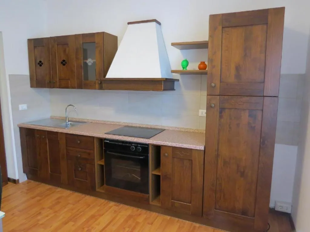 Kitchen or kitchenette in CASA AZZURRA Domodossola FREE PARKING