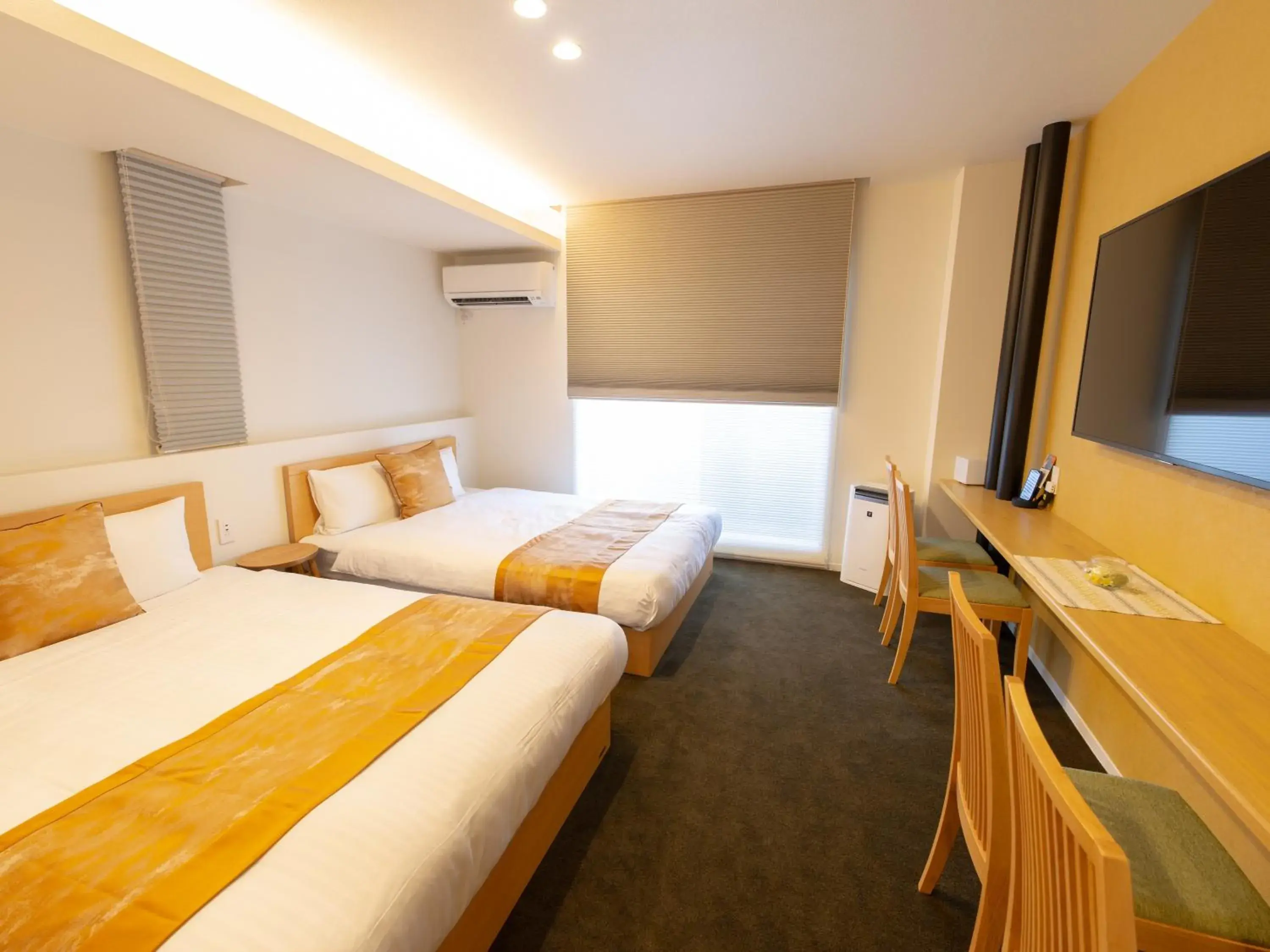 Bed in GRAND BASE Hiroshima Ekimae Bed in GRAND BASE Hiroshima Ekimae