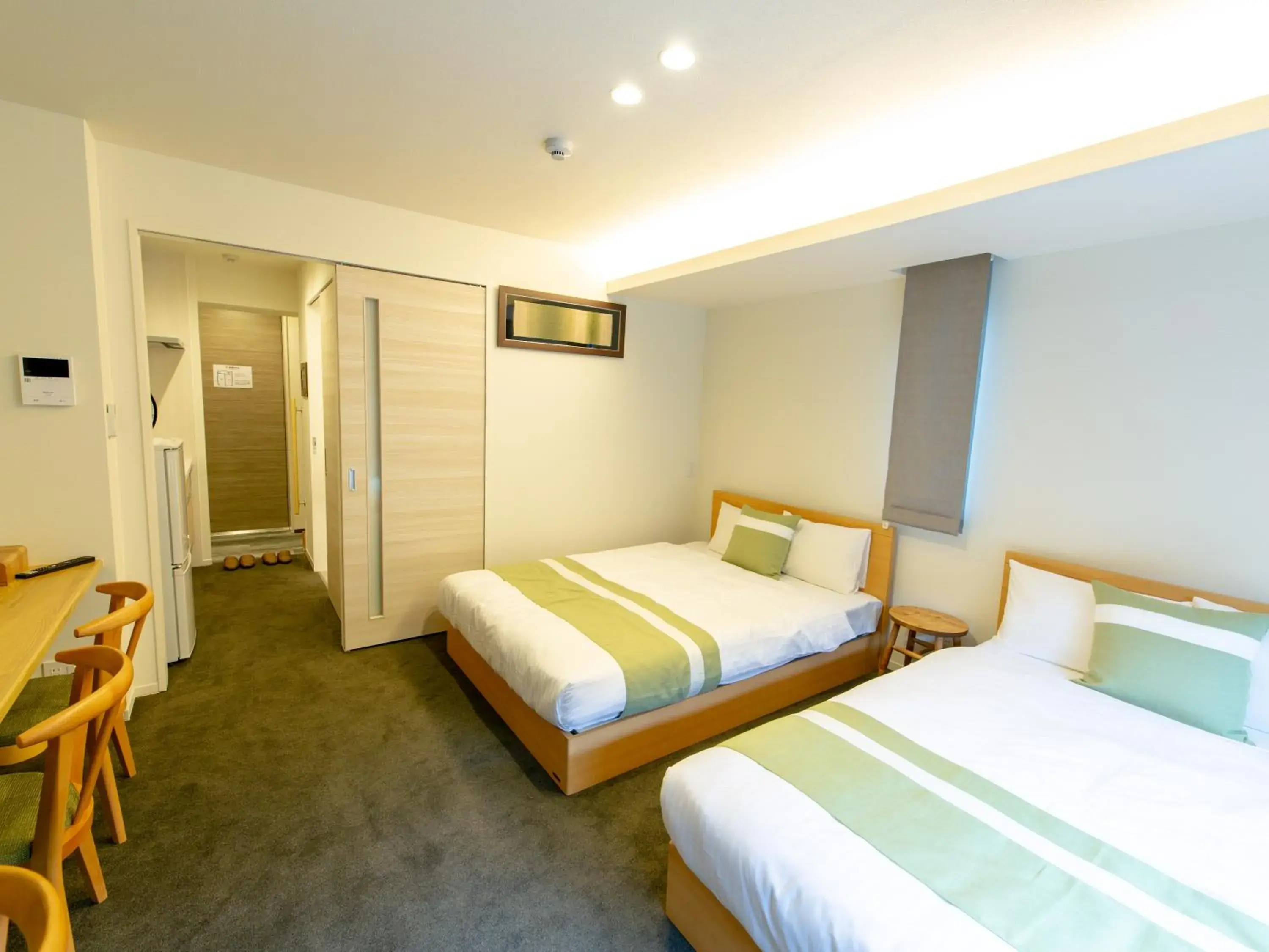 Photo of the whole room, Bed in GRAND BASE Hiroshima Ekimae Photo of the whole room, Bed in GRAND BASE Hiroshima Ekimae