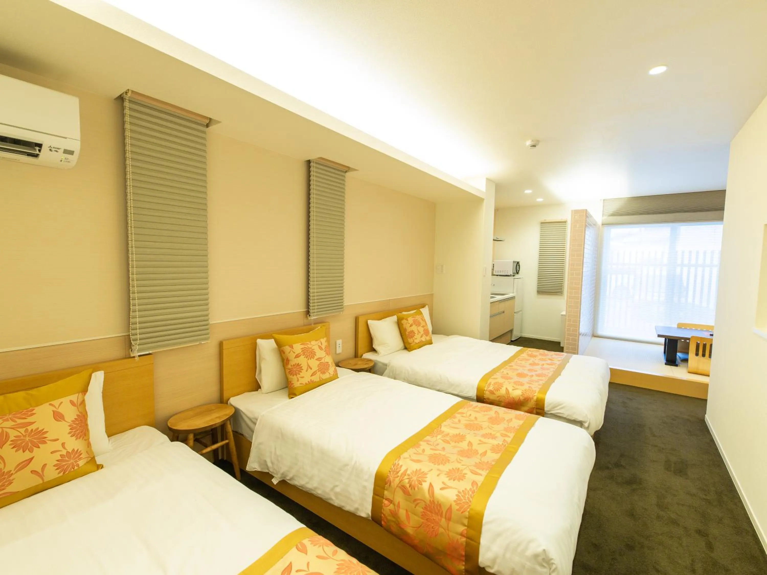 Photo of the whole room, Bed in GRAND BASE Hiroshima Ekimae