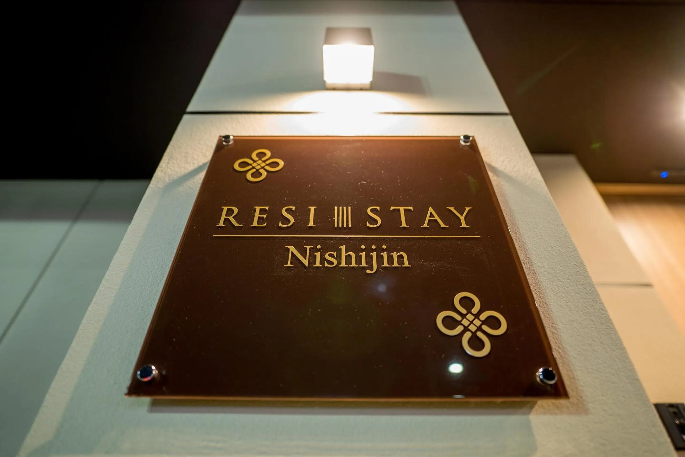 Property logo or sign in RESI STAY Nishijin