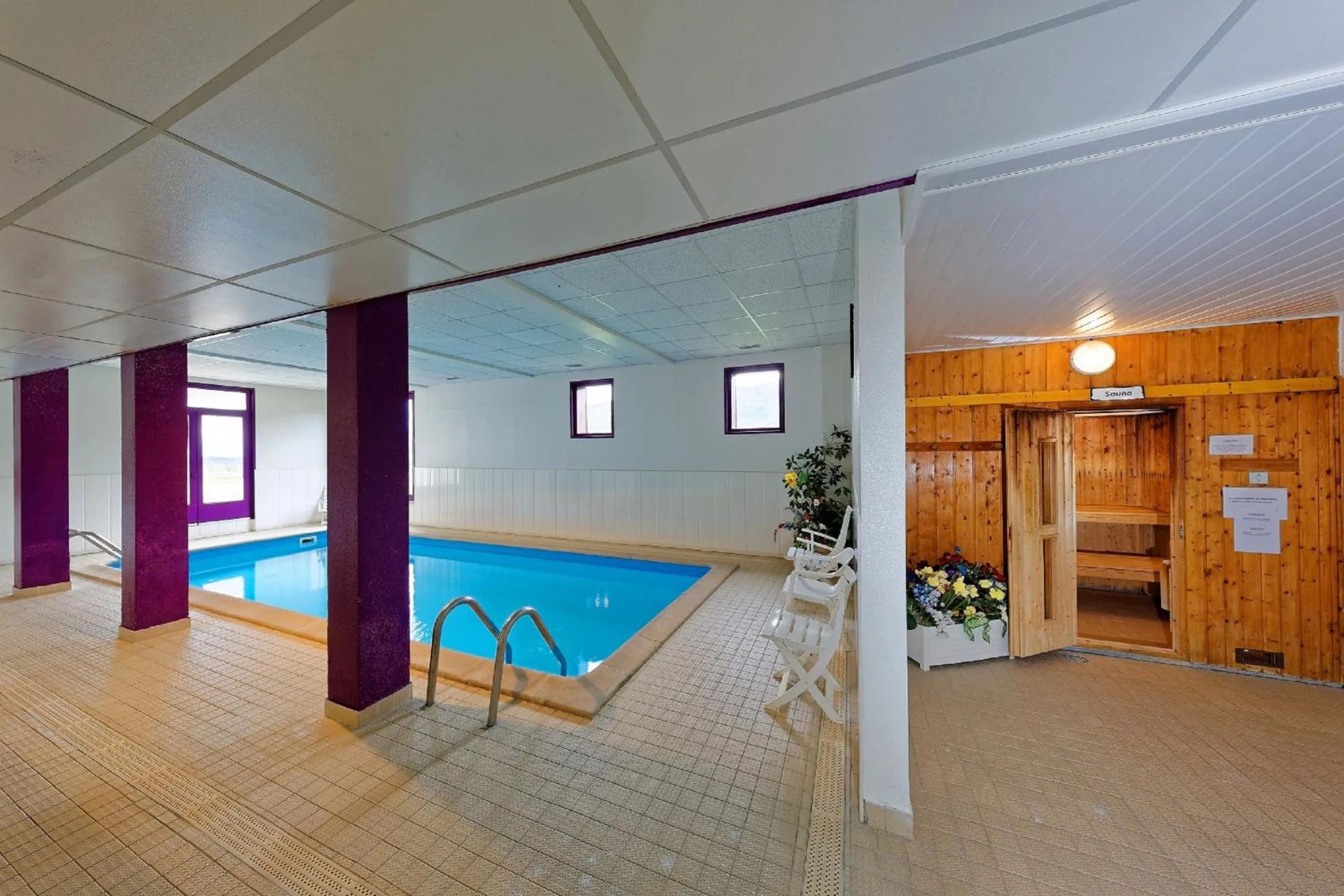 Swimming pool in Hôtel Club Le Risoux