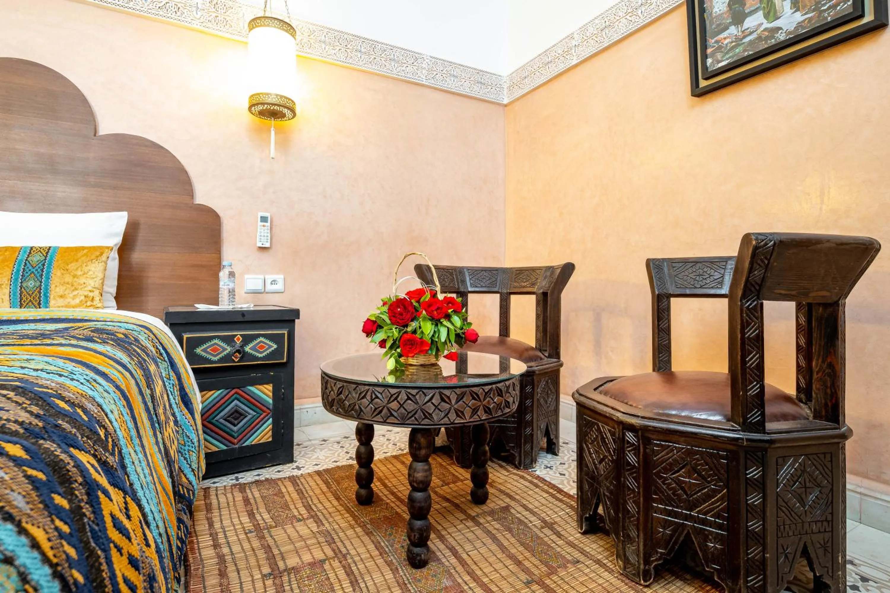 Seating area, Bed in RIAD LA GAZELLE DU SUD