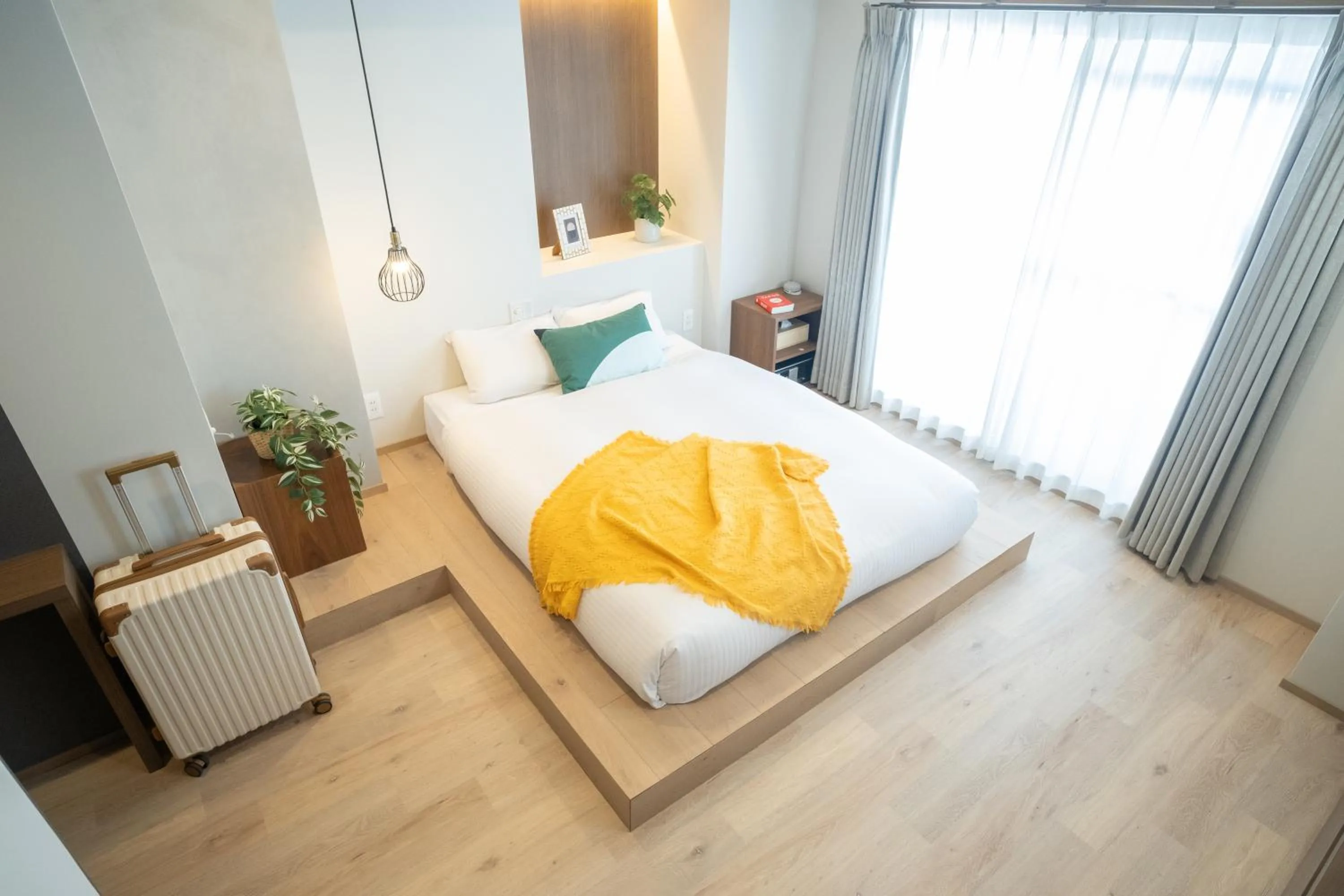 Bed in WAYFARER Kyoto Shijo