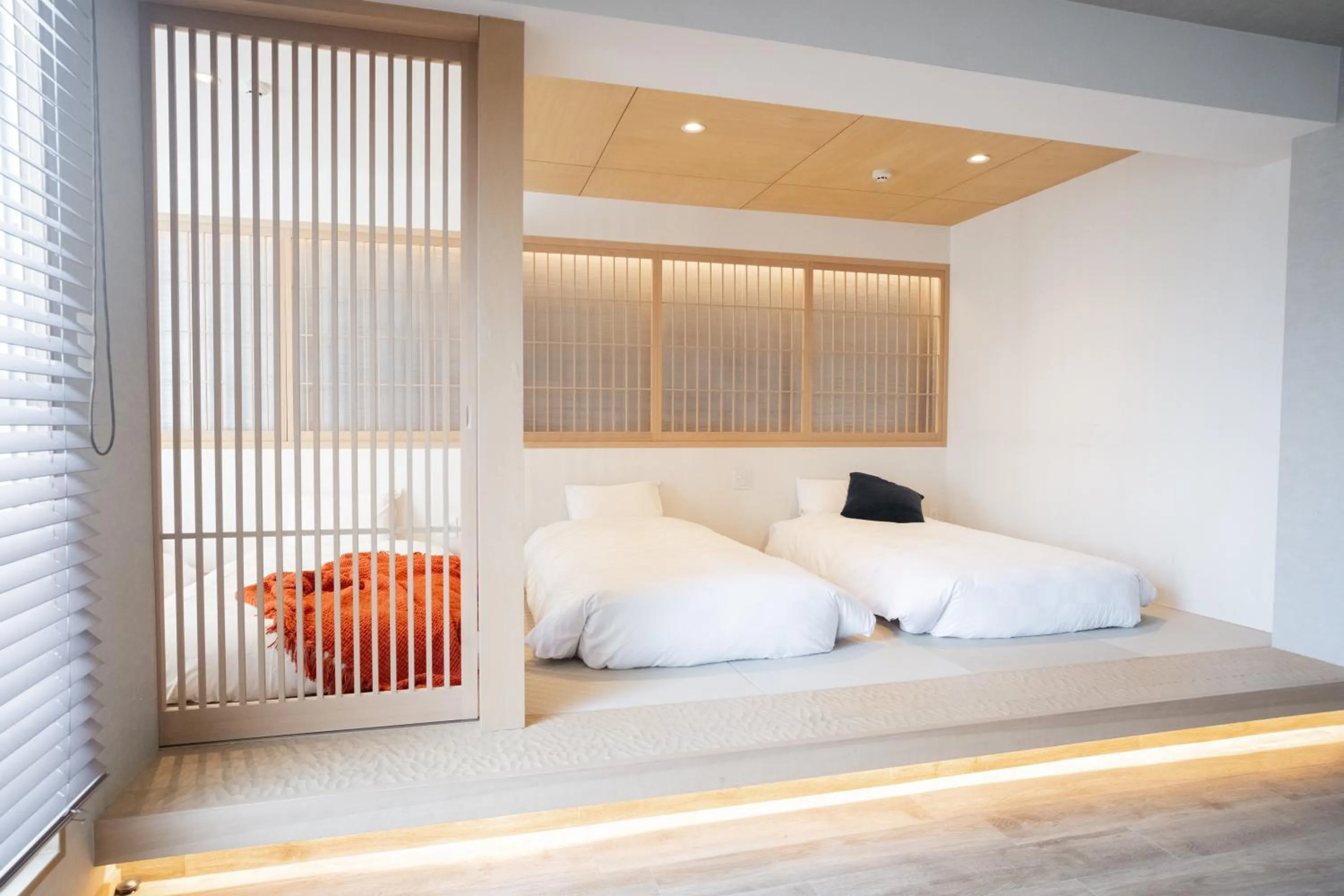 Bed in WAYFARER Kyoto Shijo