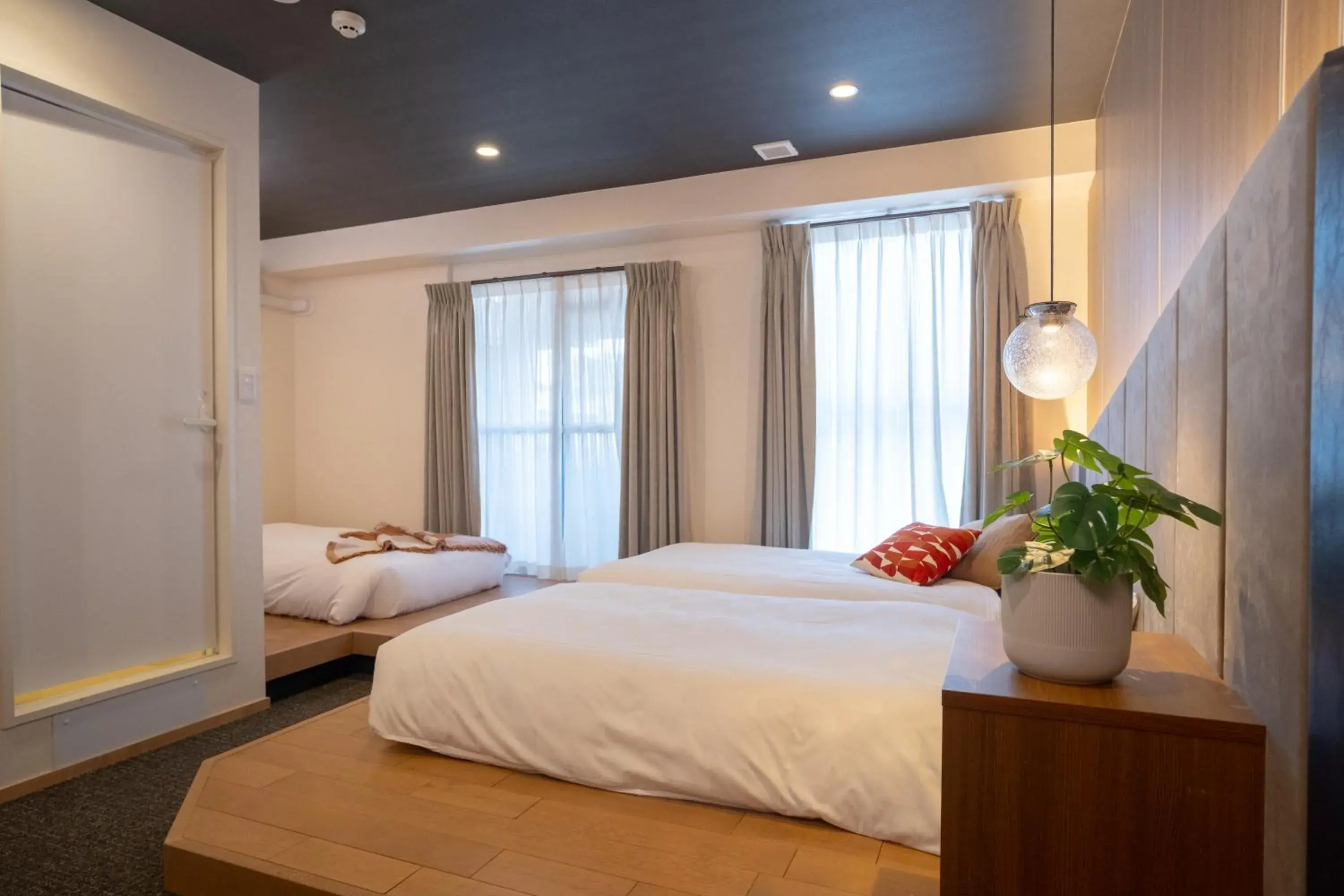 Bed in WAYFARER Kyoto Shijo Bed in WAYFARER Kyoto Shijo