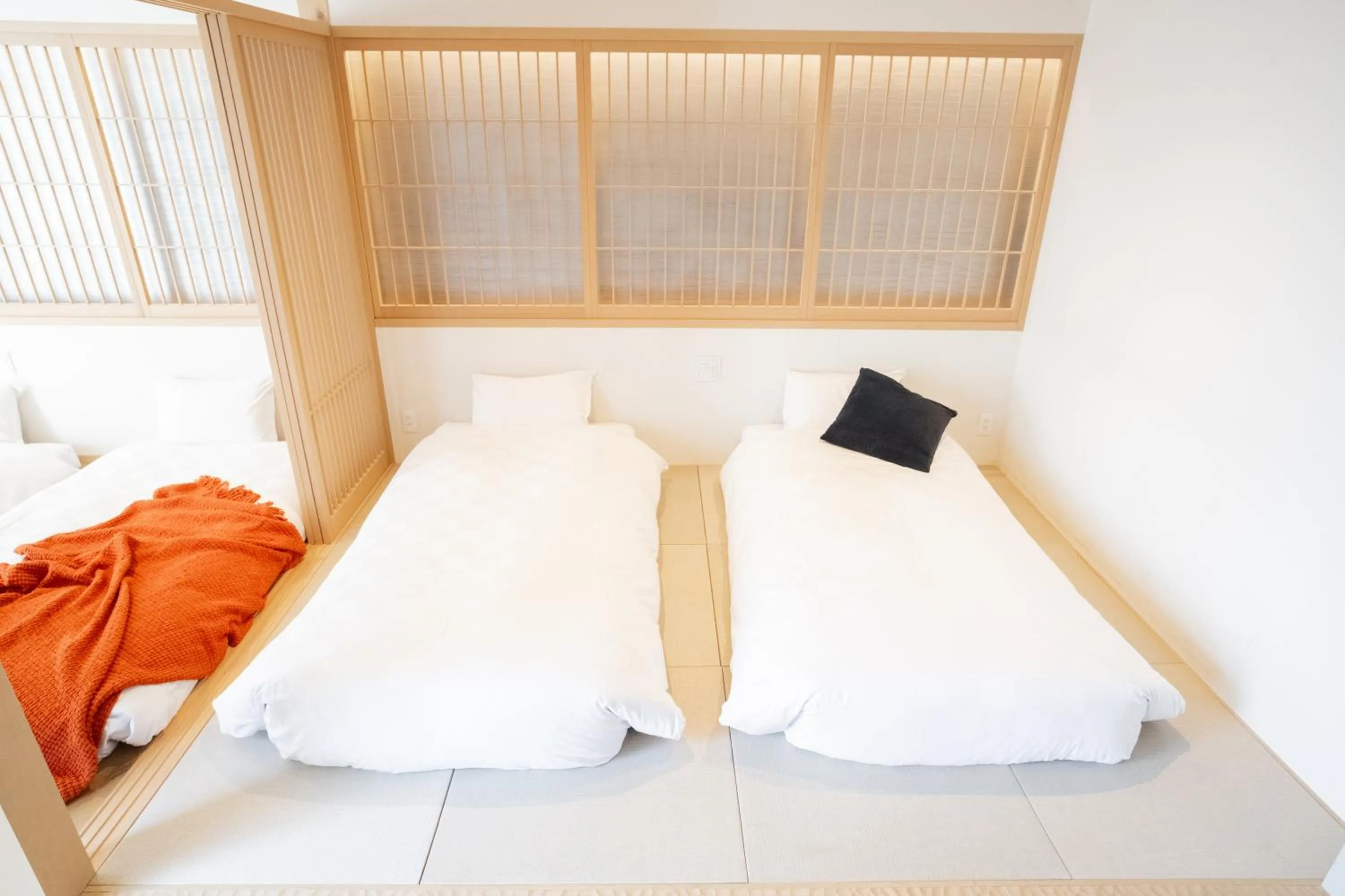 Bed in WAYFARER Kyoto Shijo