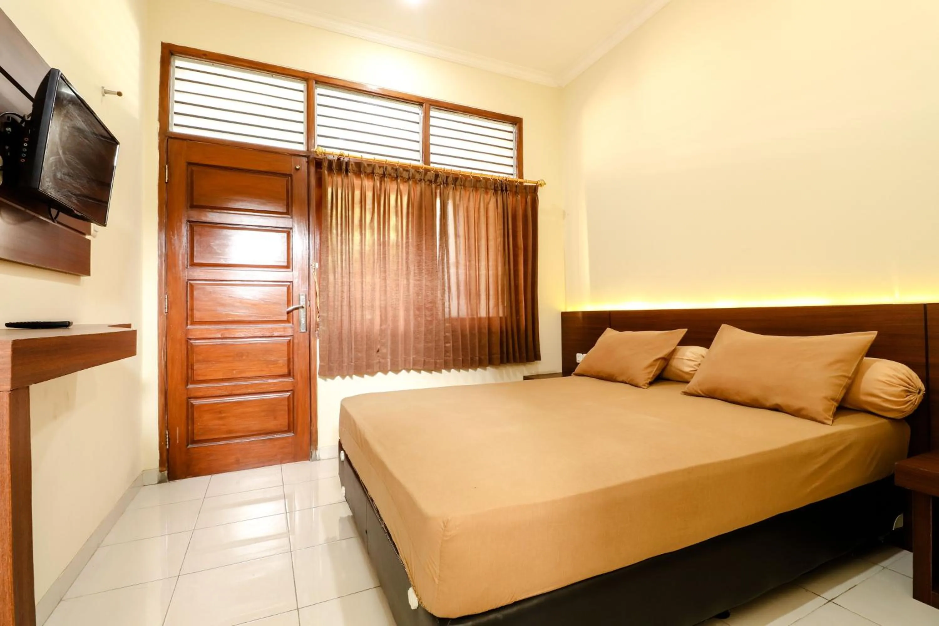 Bed in Hotel Bungurasih Syariah