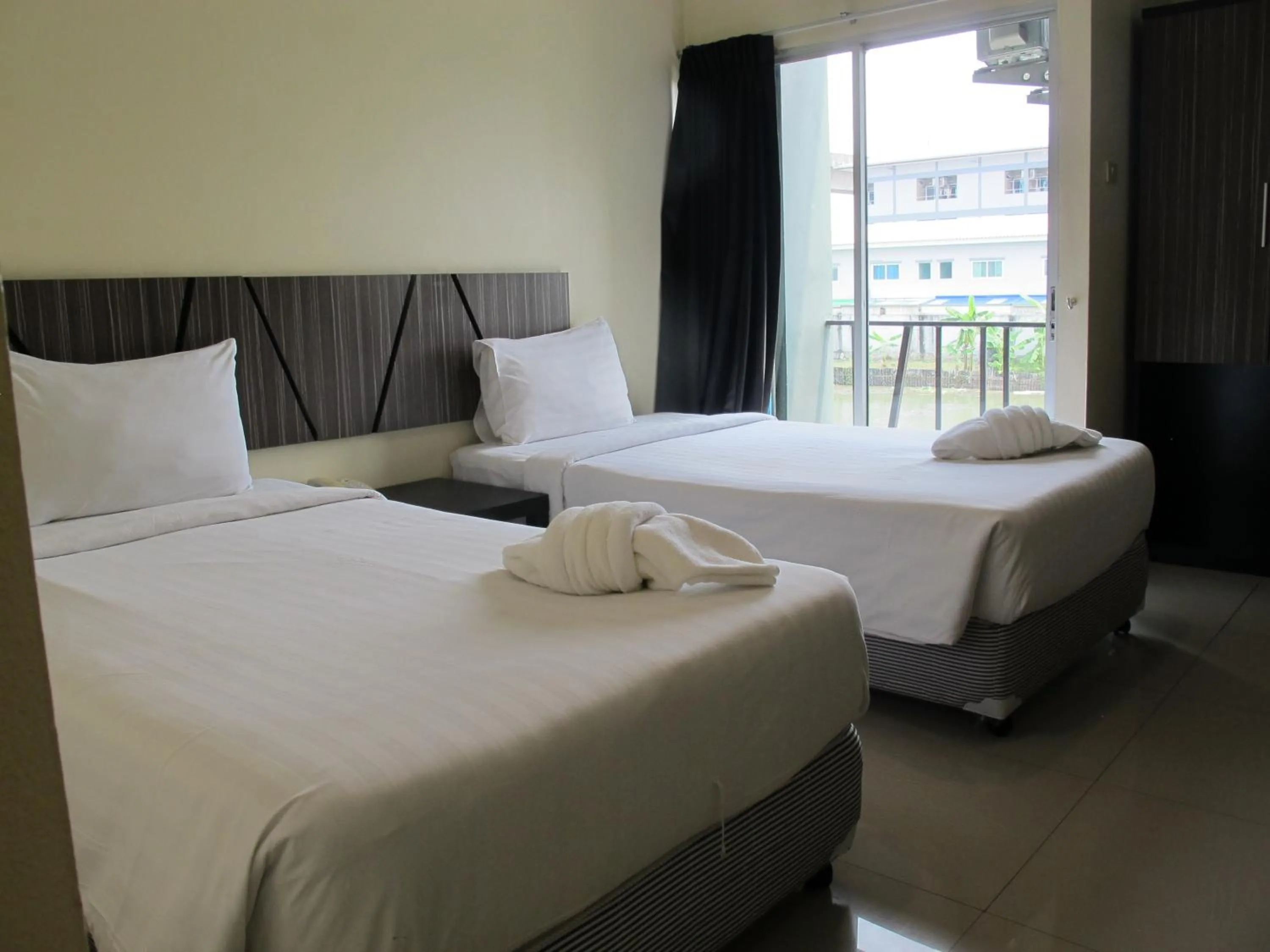 Bed in The Airy Residence