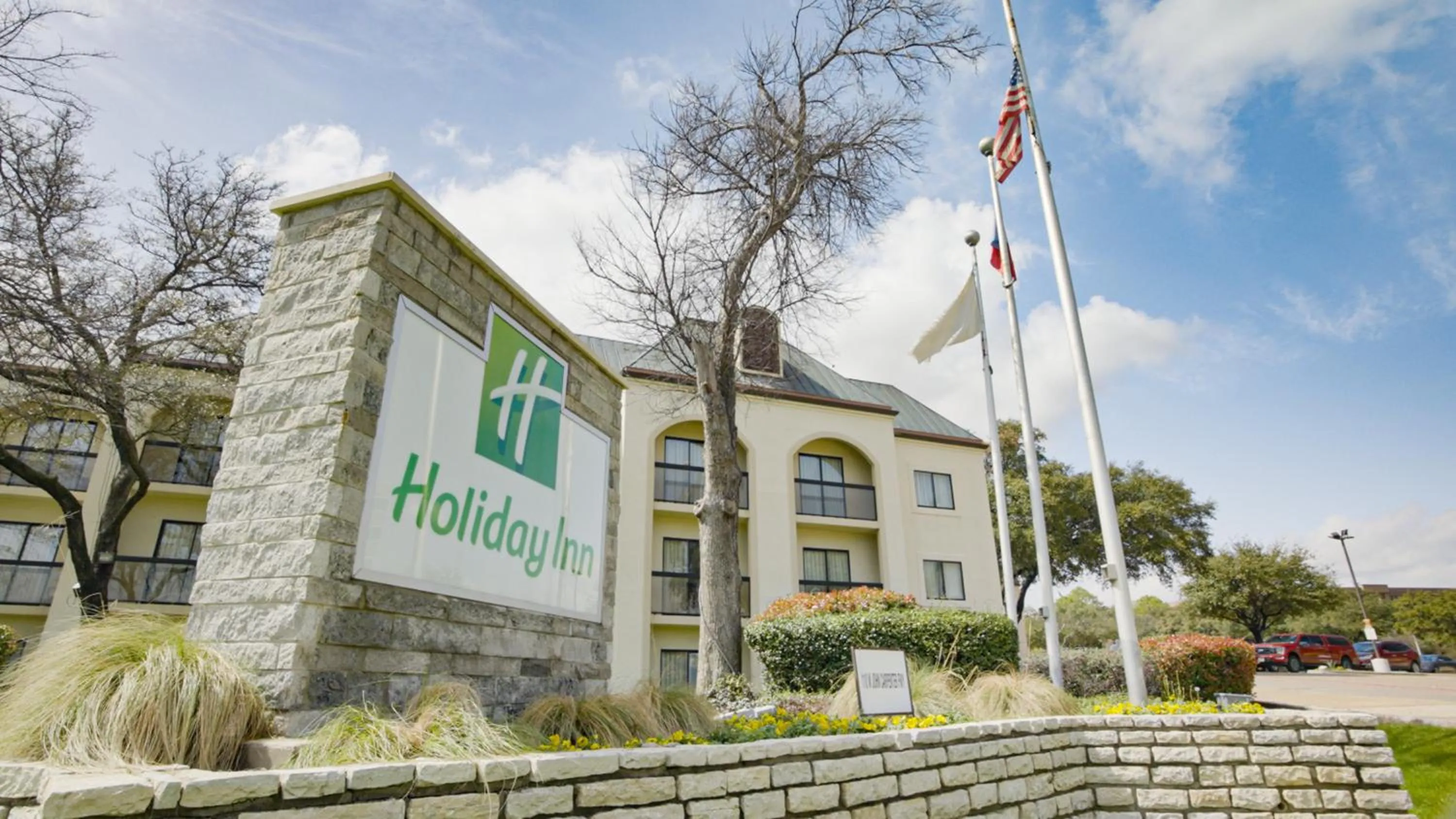 Property building in Holiday Inn Irving Las Colinas by IHG