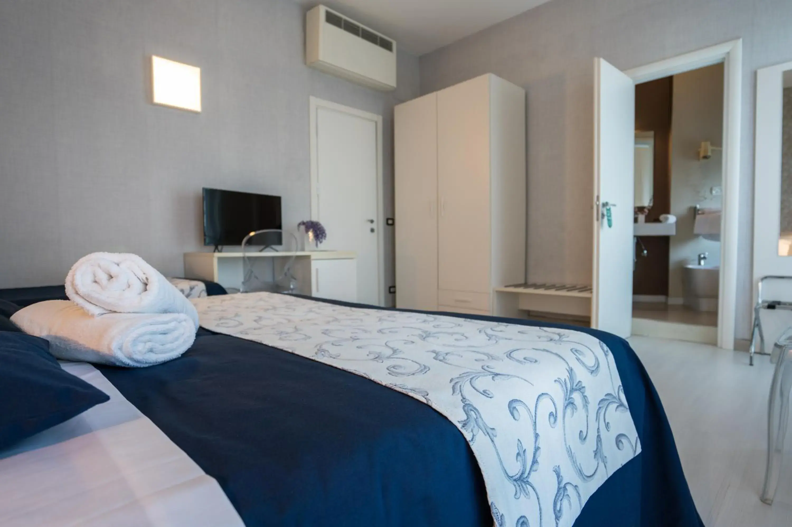 Bed in Hotel Baia Azzurra Bed in Hotel Baia Azzurra