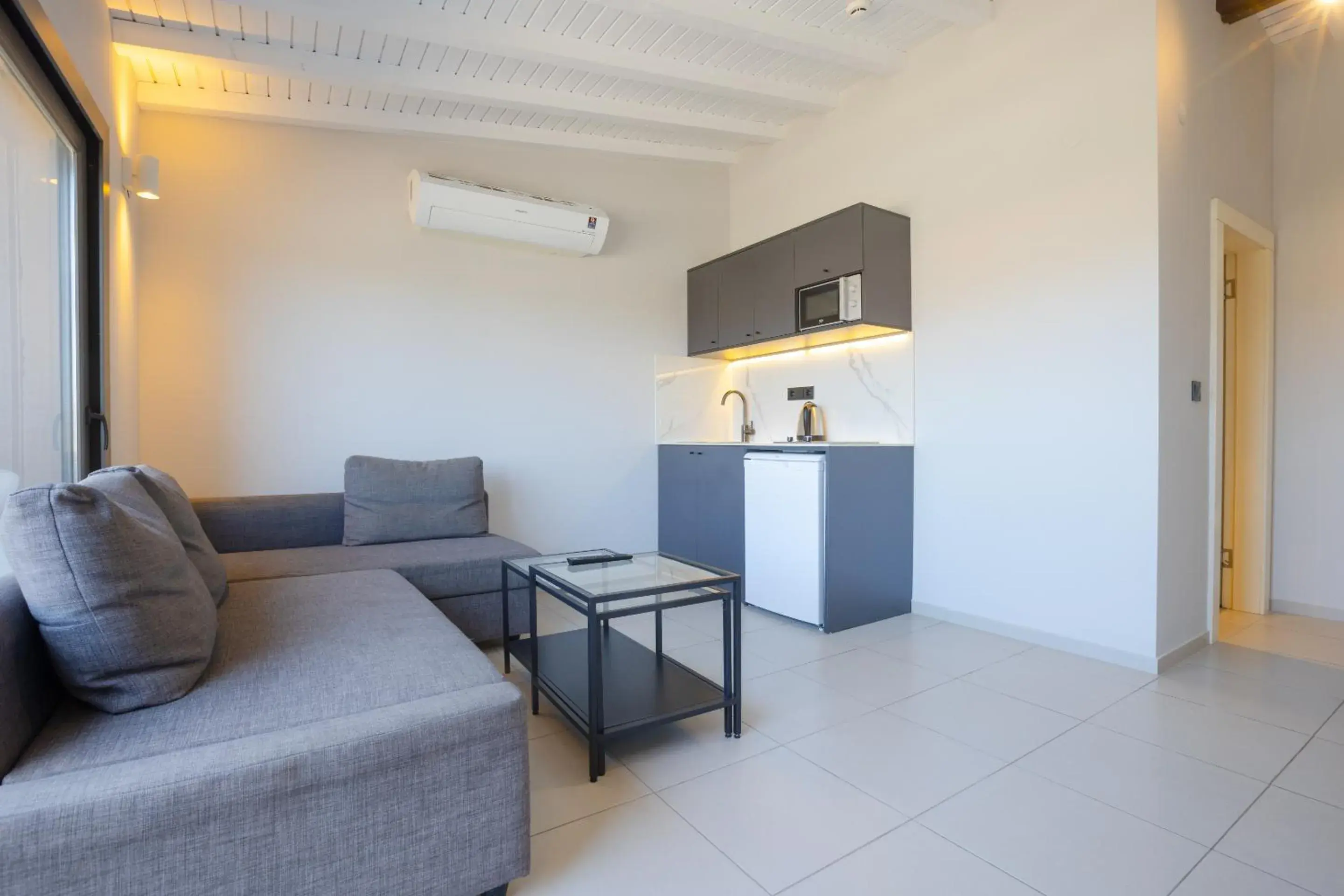 Living room in AEGEAN Apartments - Marina & Chios Island View Living room in AEGEAN Apartments - Marina & Chios Island View