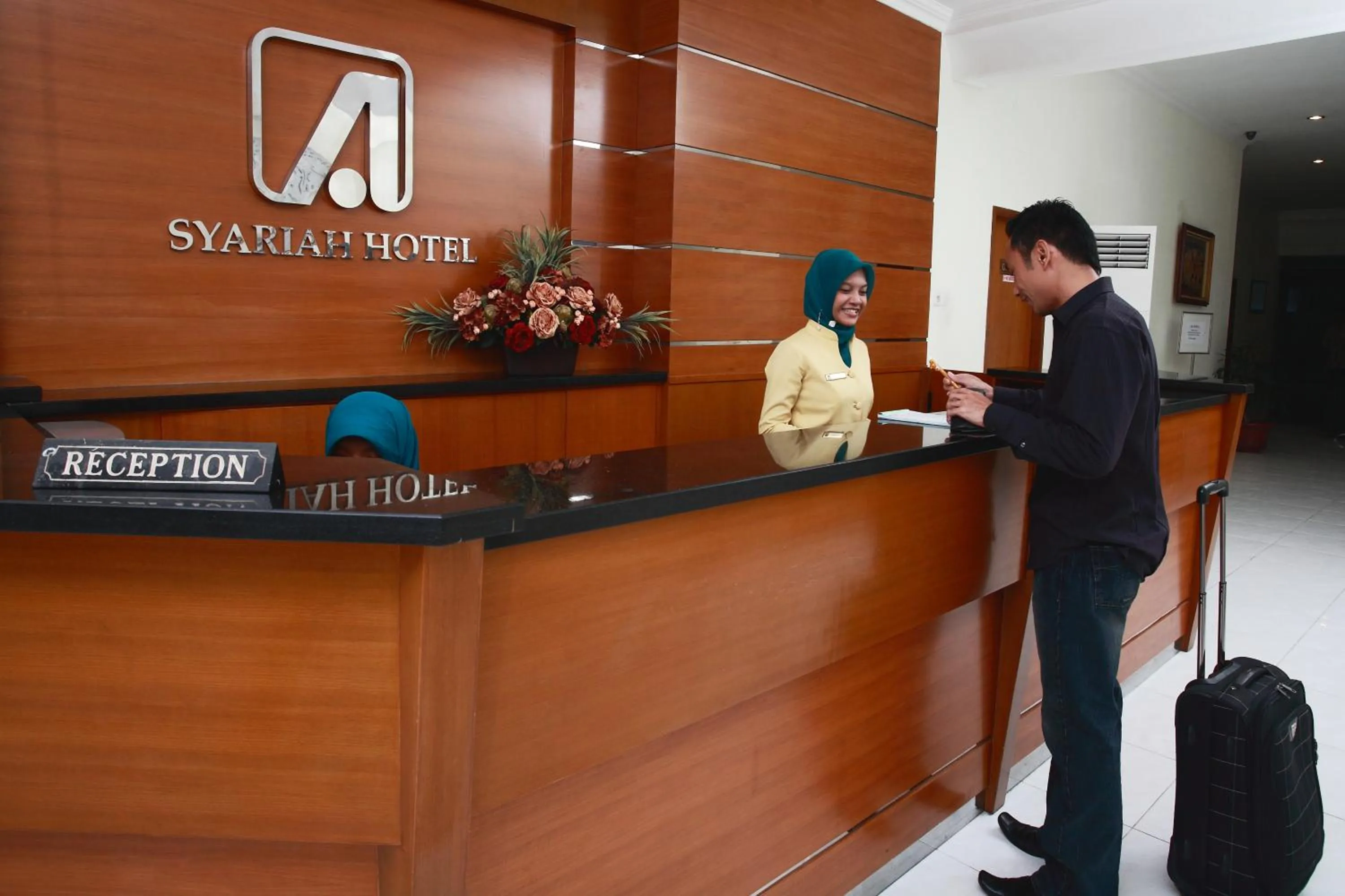Lobby or reception in Syariah Arini Hotel