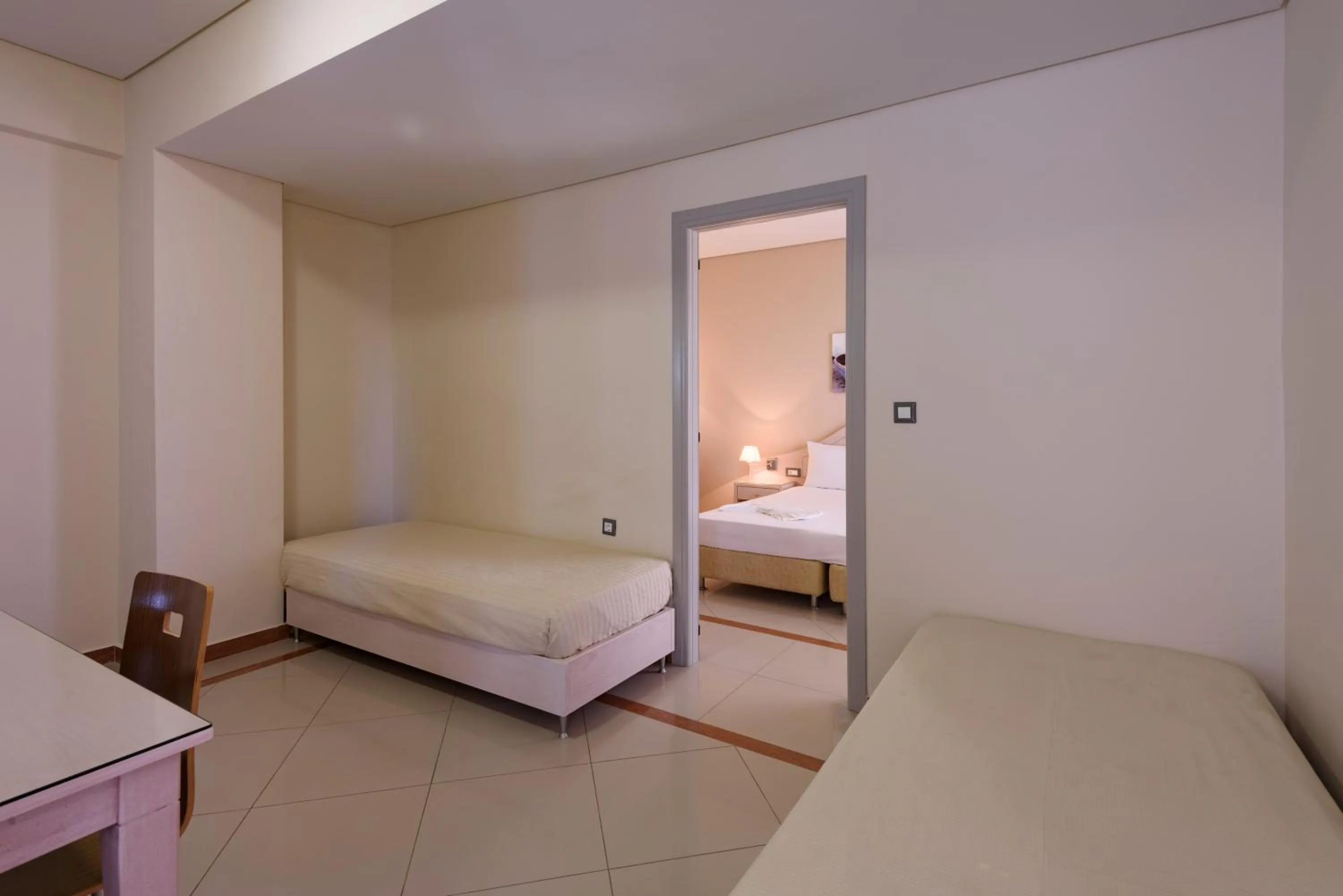 Bed in Hotel Poseidon