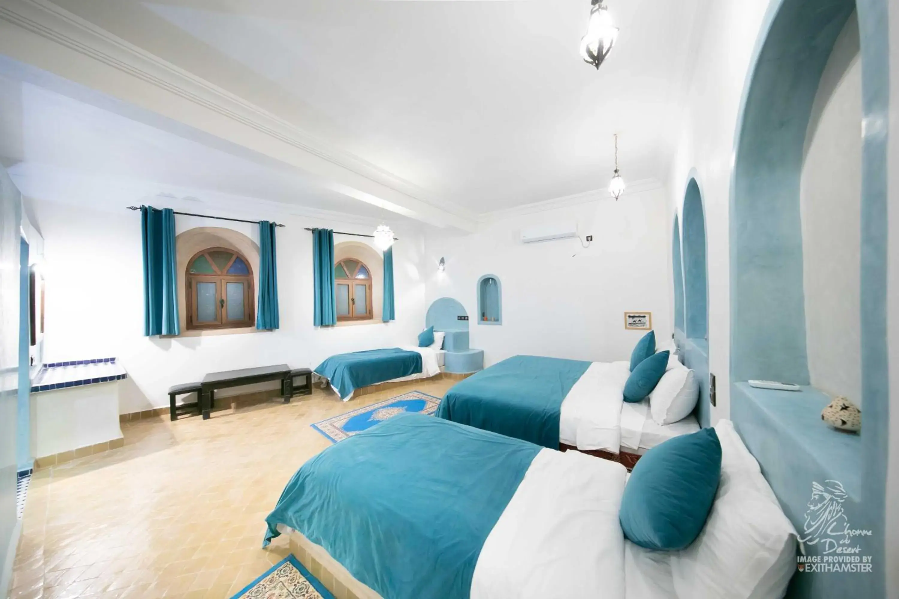 Triple Room in L'homme Du Désert A Merzouga Triple Room in L'homme Du Désert A Merzouga