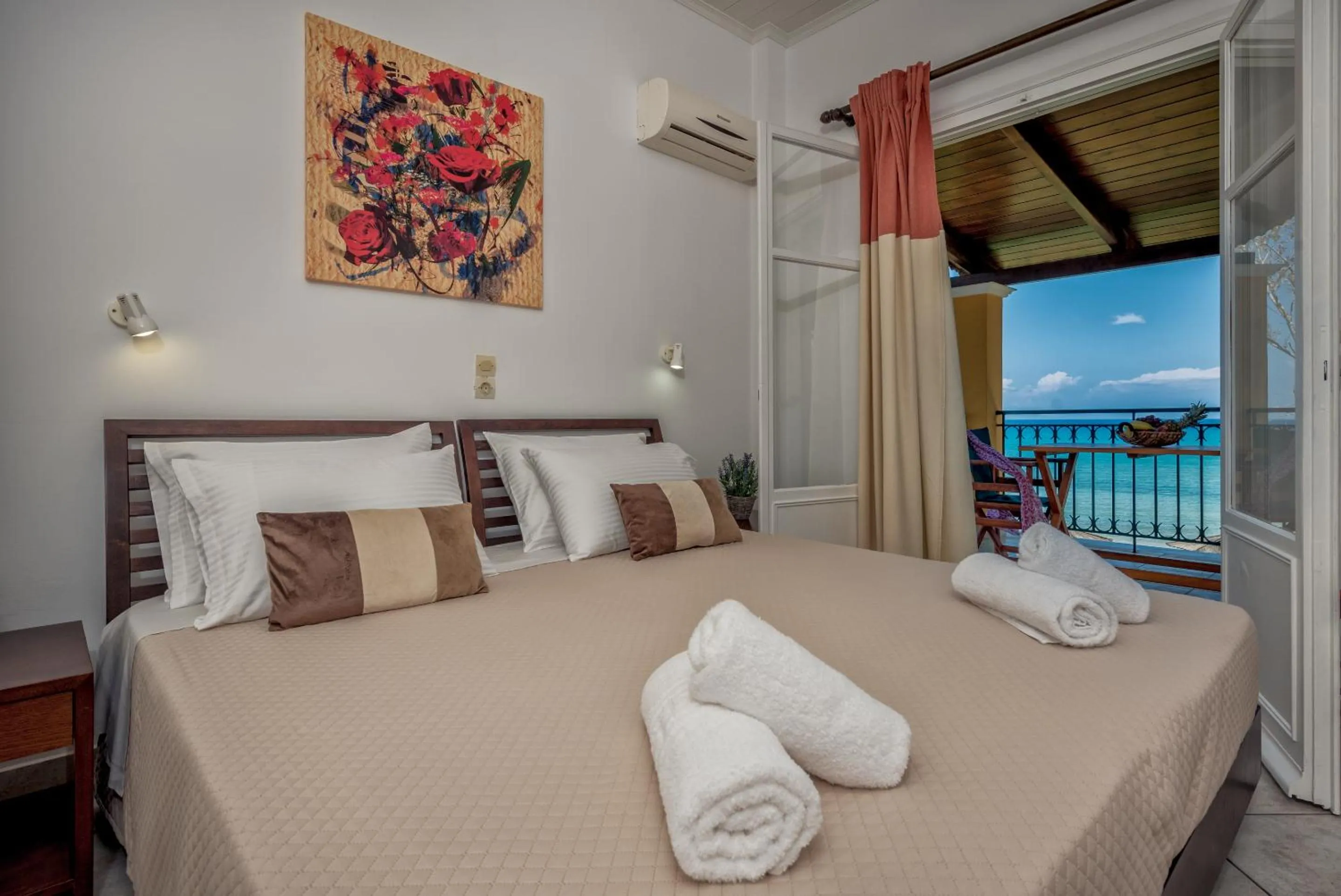 Bed in Zarkadis Beach Apartments