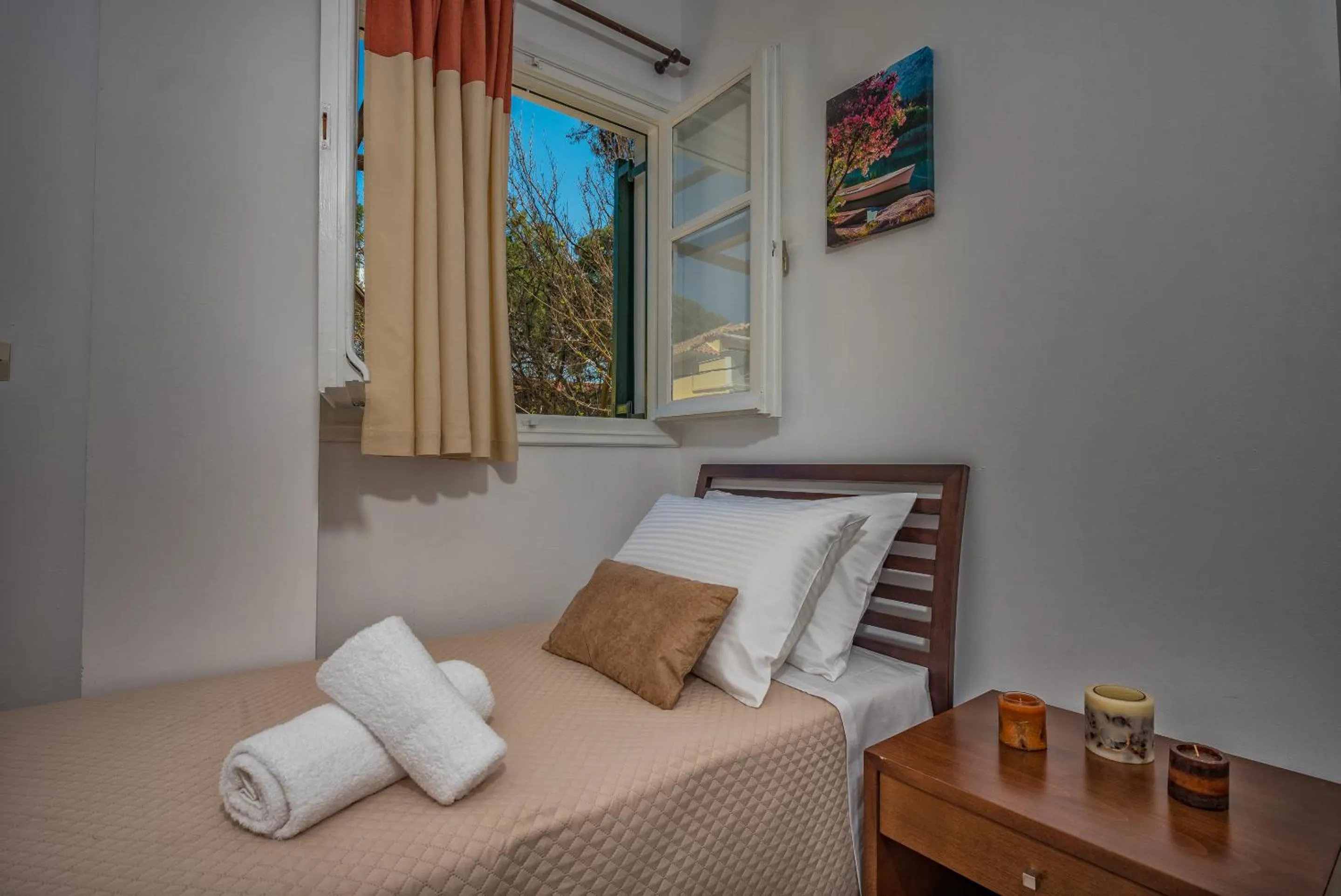 Bed in Zarkadis Beach Apartments