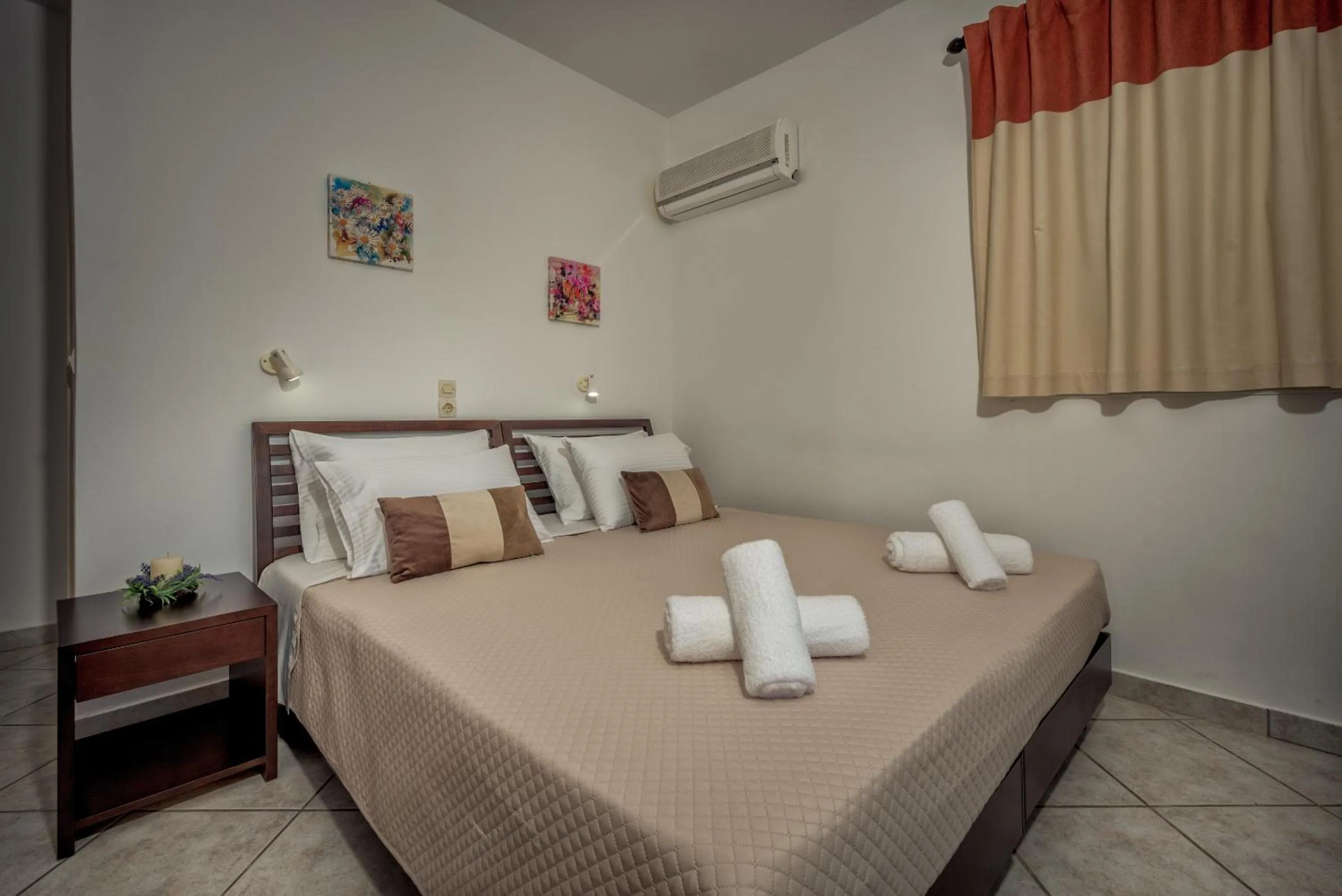 Bed in Zarkadis Beach Apartments