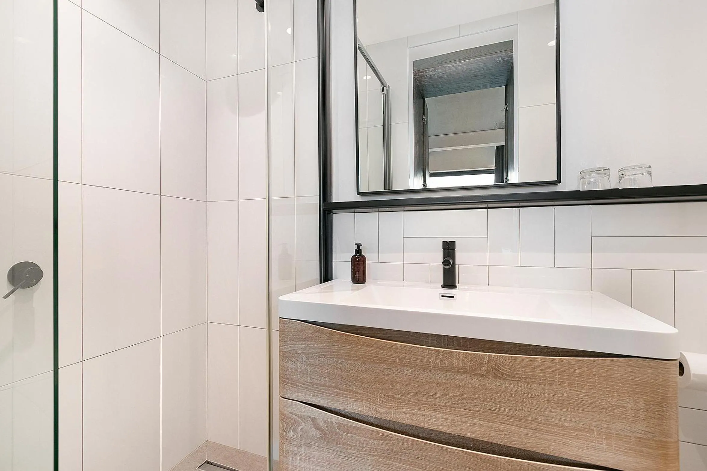 Bathroom in Latitude Aparthotel by Totalstay