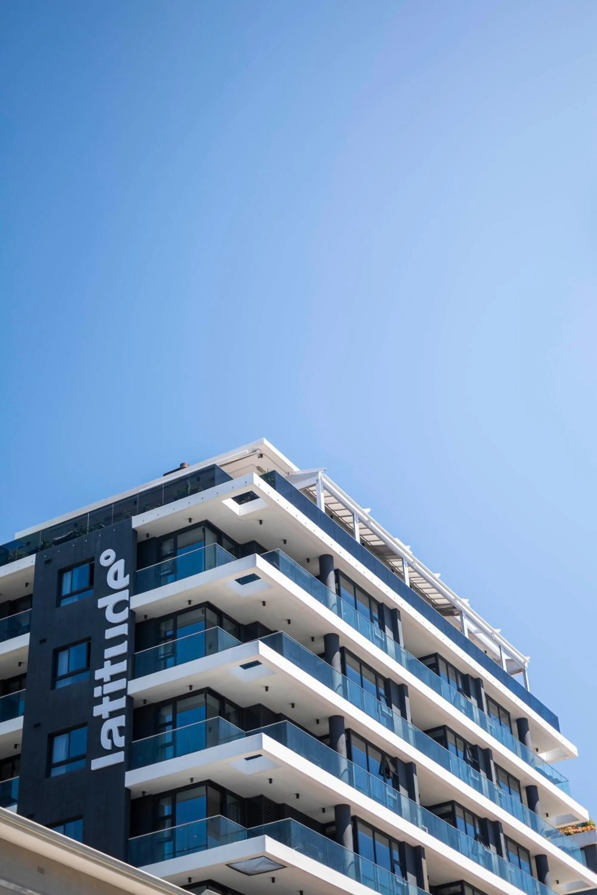 Property building in Latitude Aparthotel by Totalstay