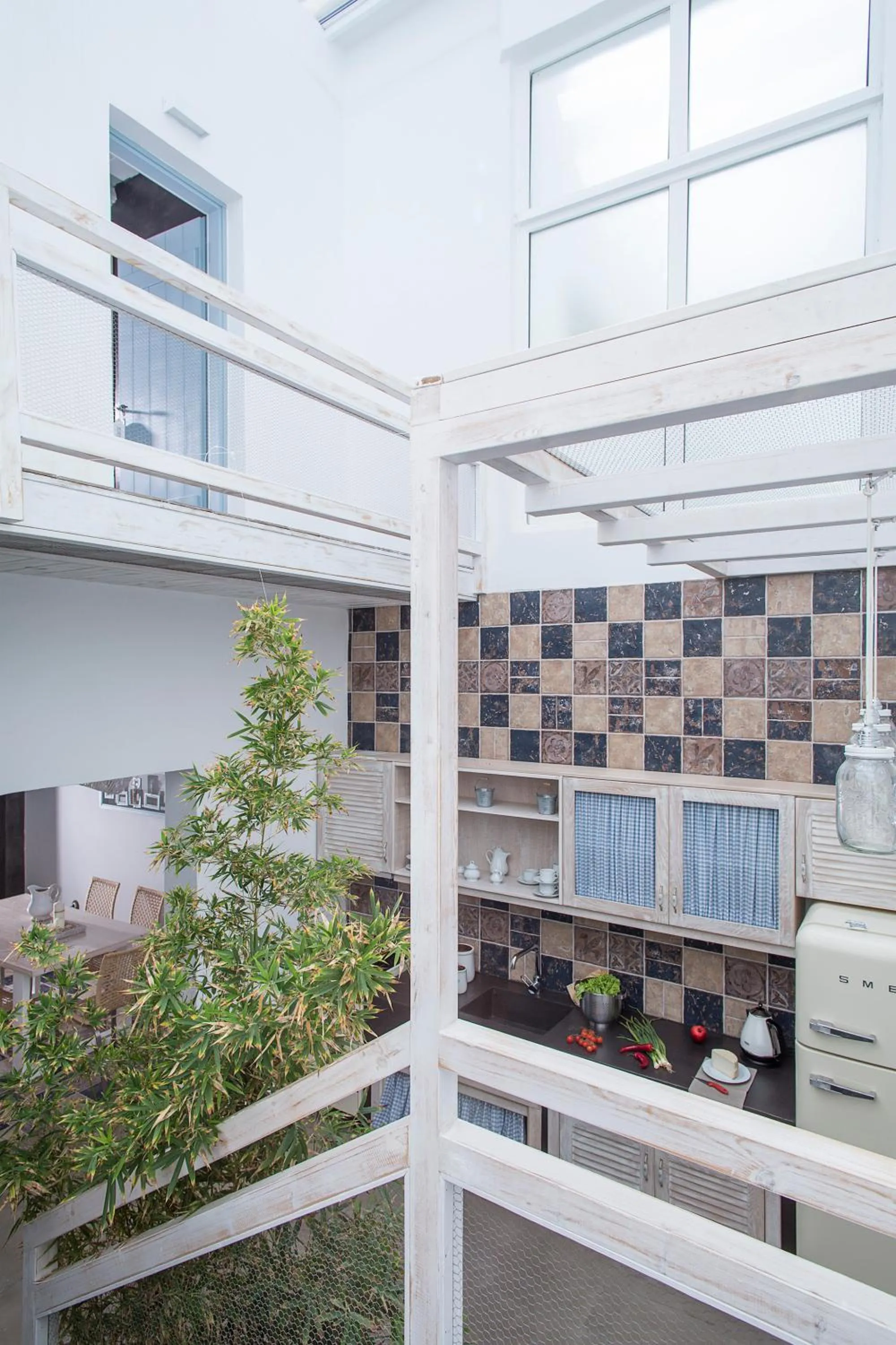 Kitchen or kitchenette in Melograno Villas