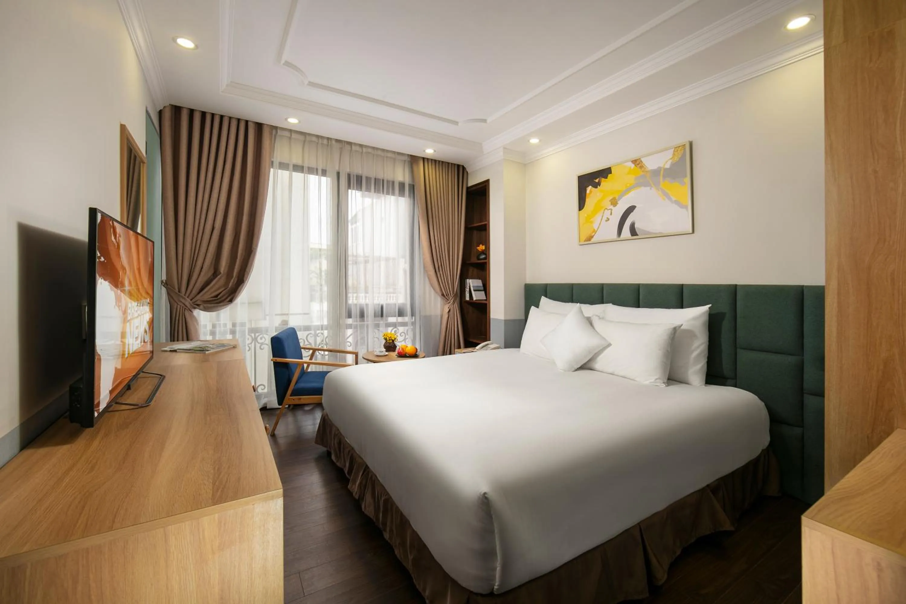 TV and multimedia, Bed in C'Bon Hotel Do Quang