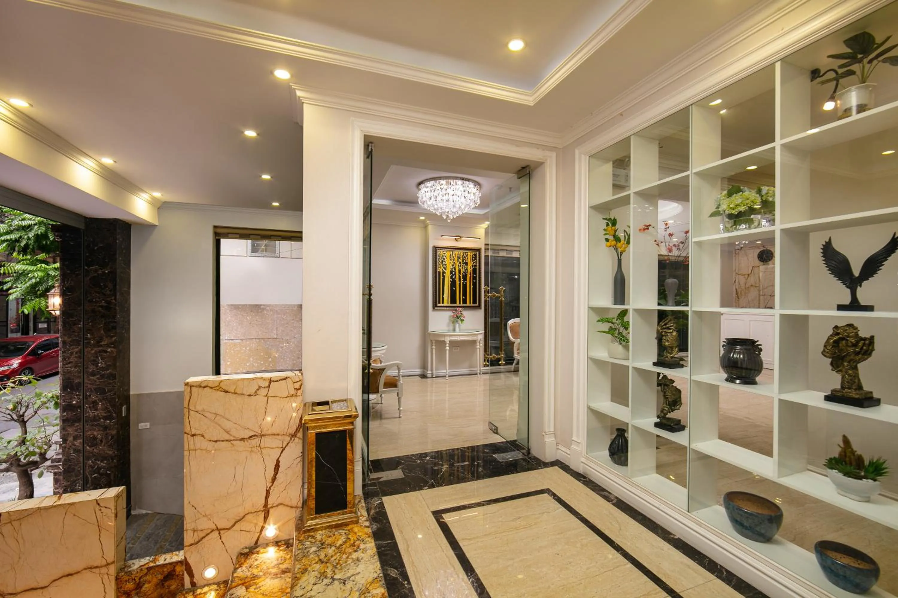 Communal lounge/ TV room in C'Bon Hotel Do Quang