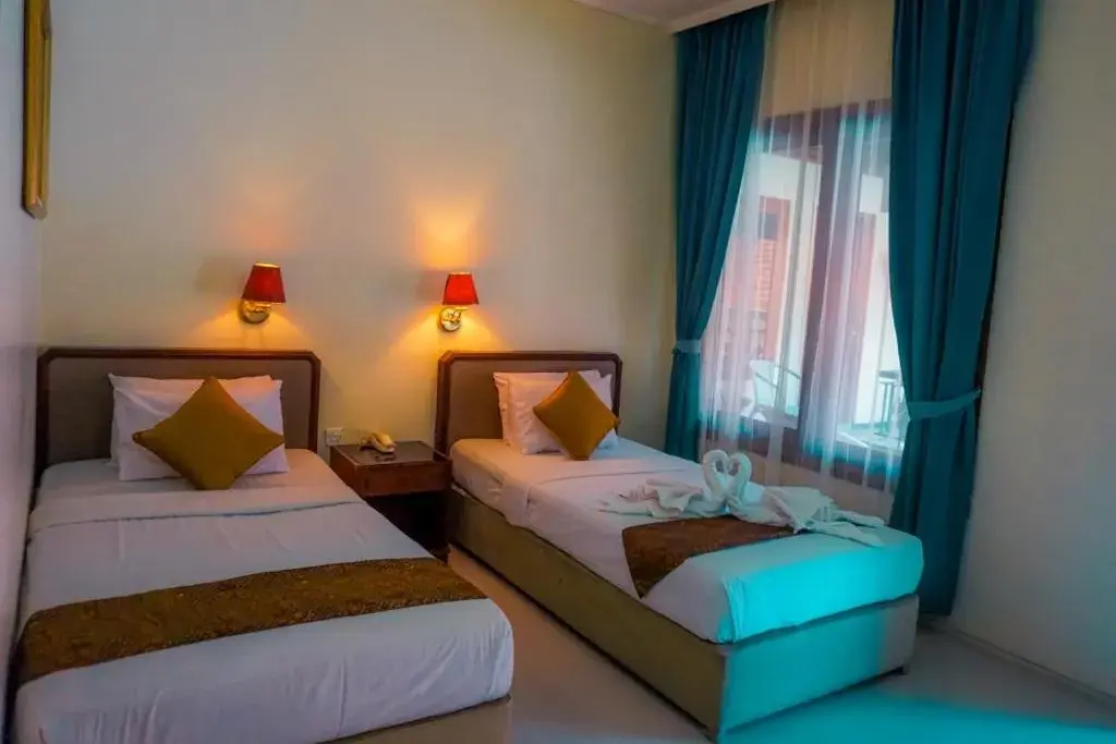 Bed in Mandala Wisata Hotel Bed in Mandala Wisata Hotel