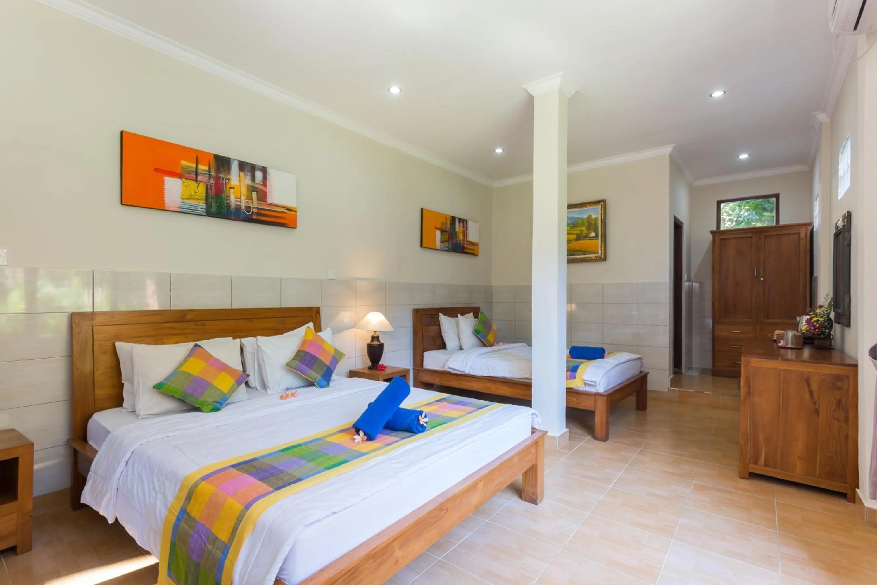 Bed in Wenara Bali Bungalows