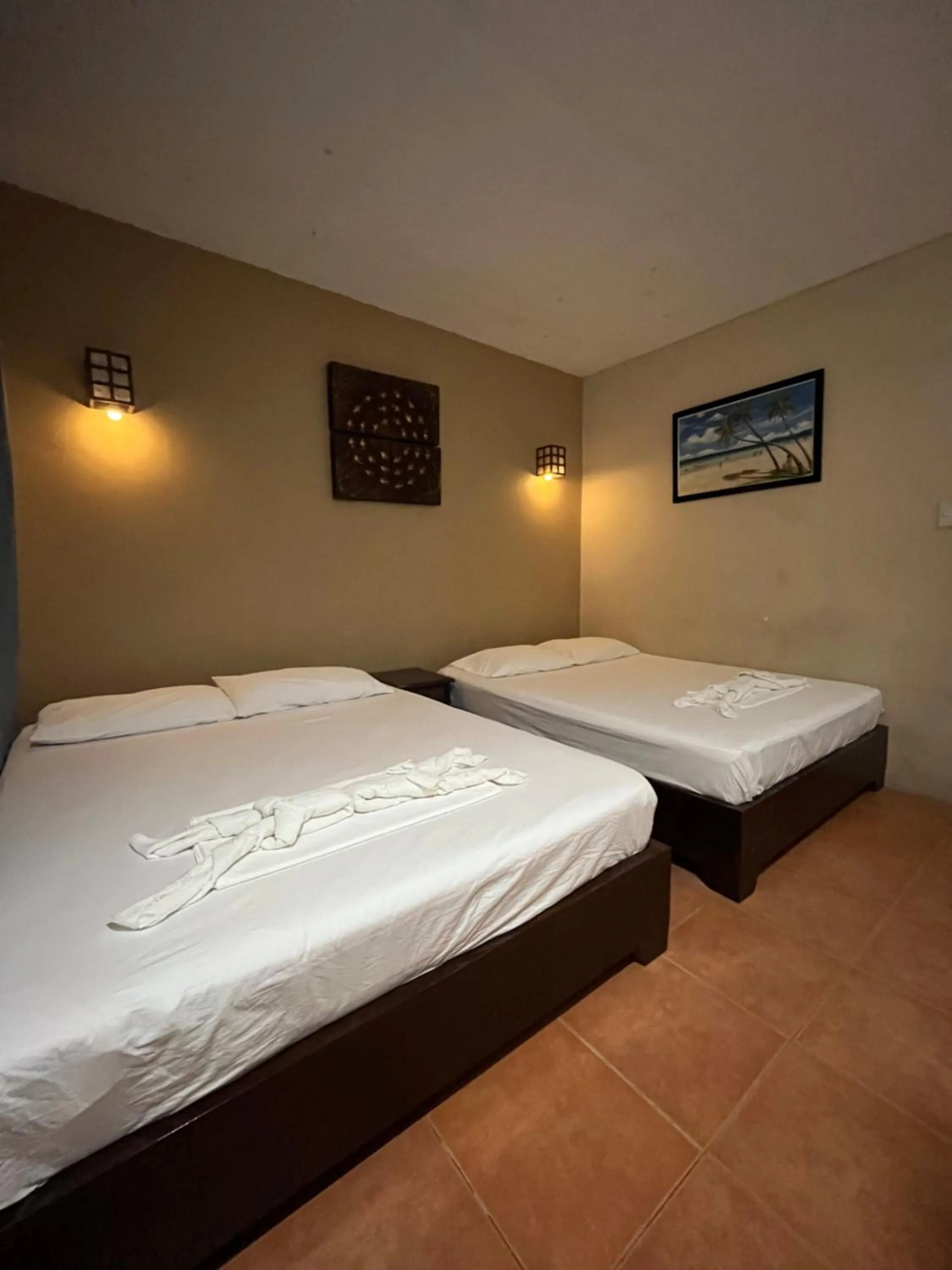 Bed in Boracay Ocean Bay Hotel