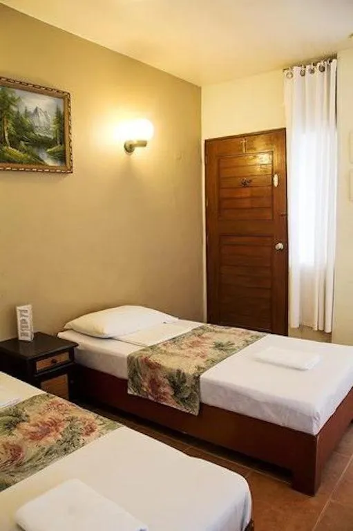 Bed in Boracay Ocean Bay Hotel