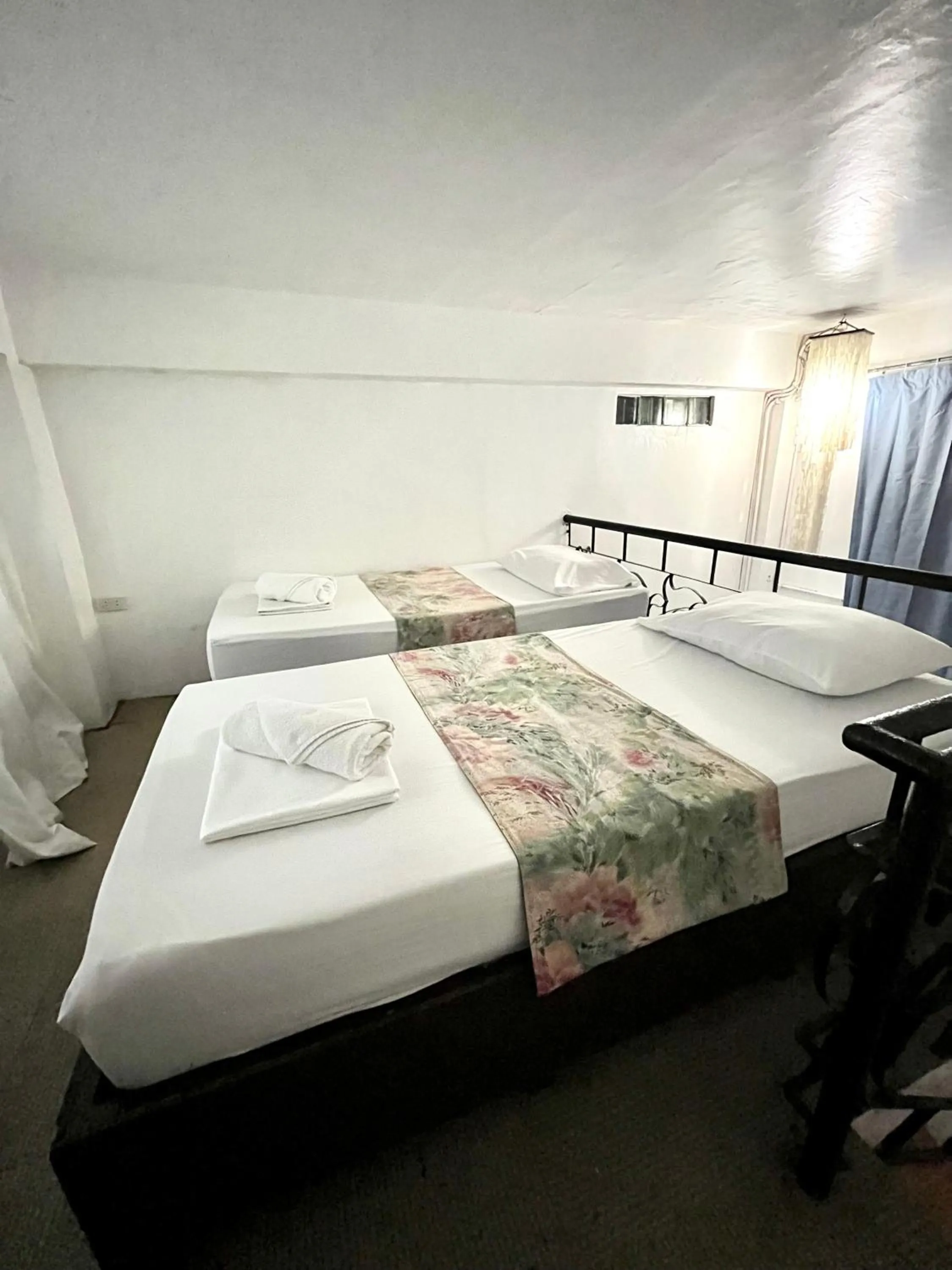 Bed in Boracay Ocean Bay Hotel