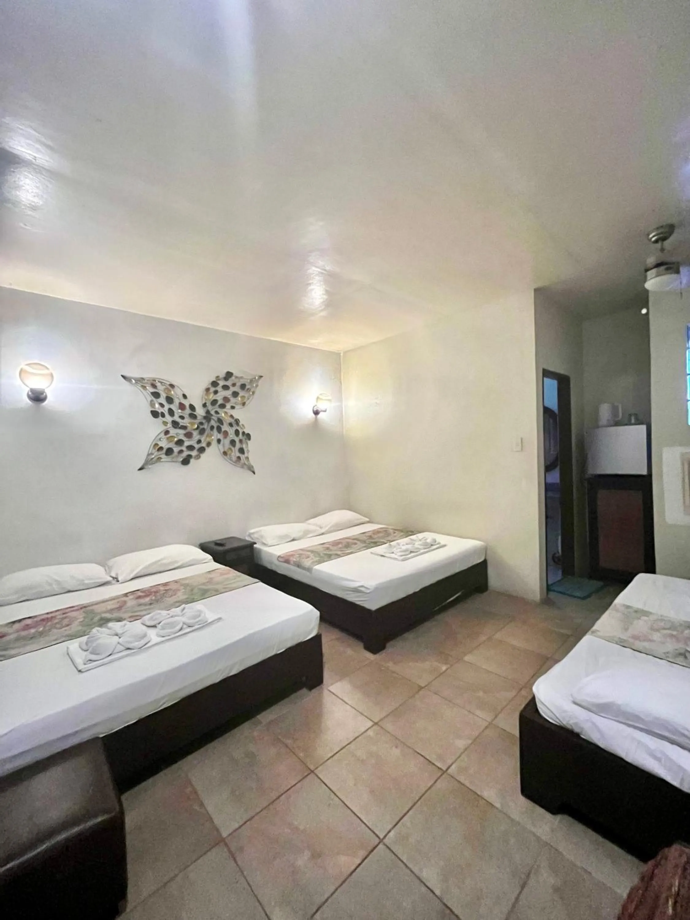 Bed in Boracay Ocean Bay Hotel