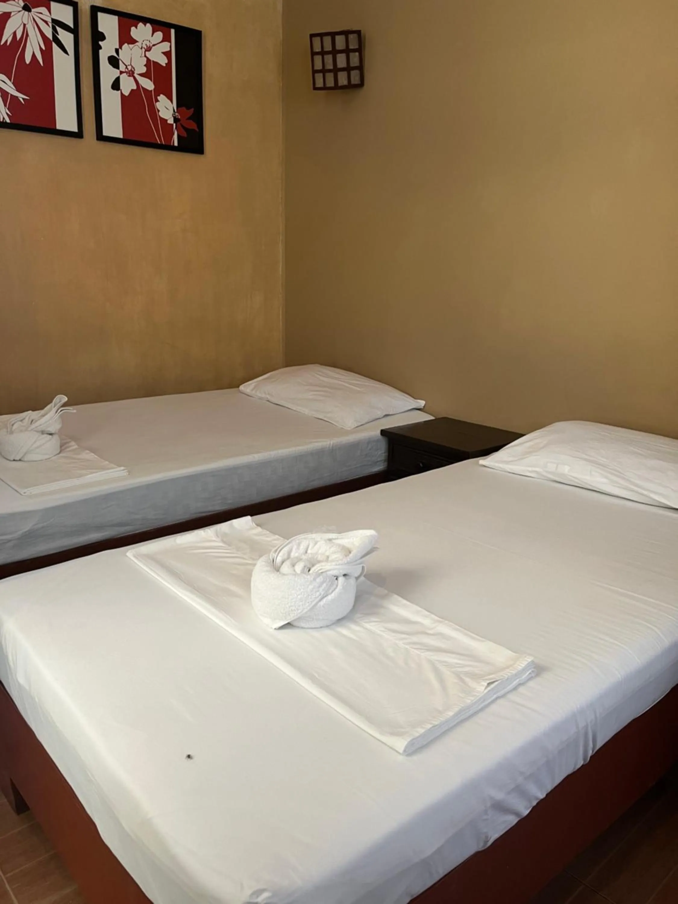 Bed in Boracay Ocean Bay Hotel