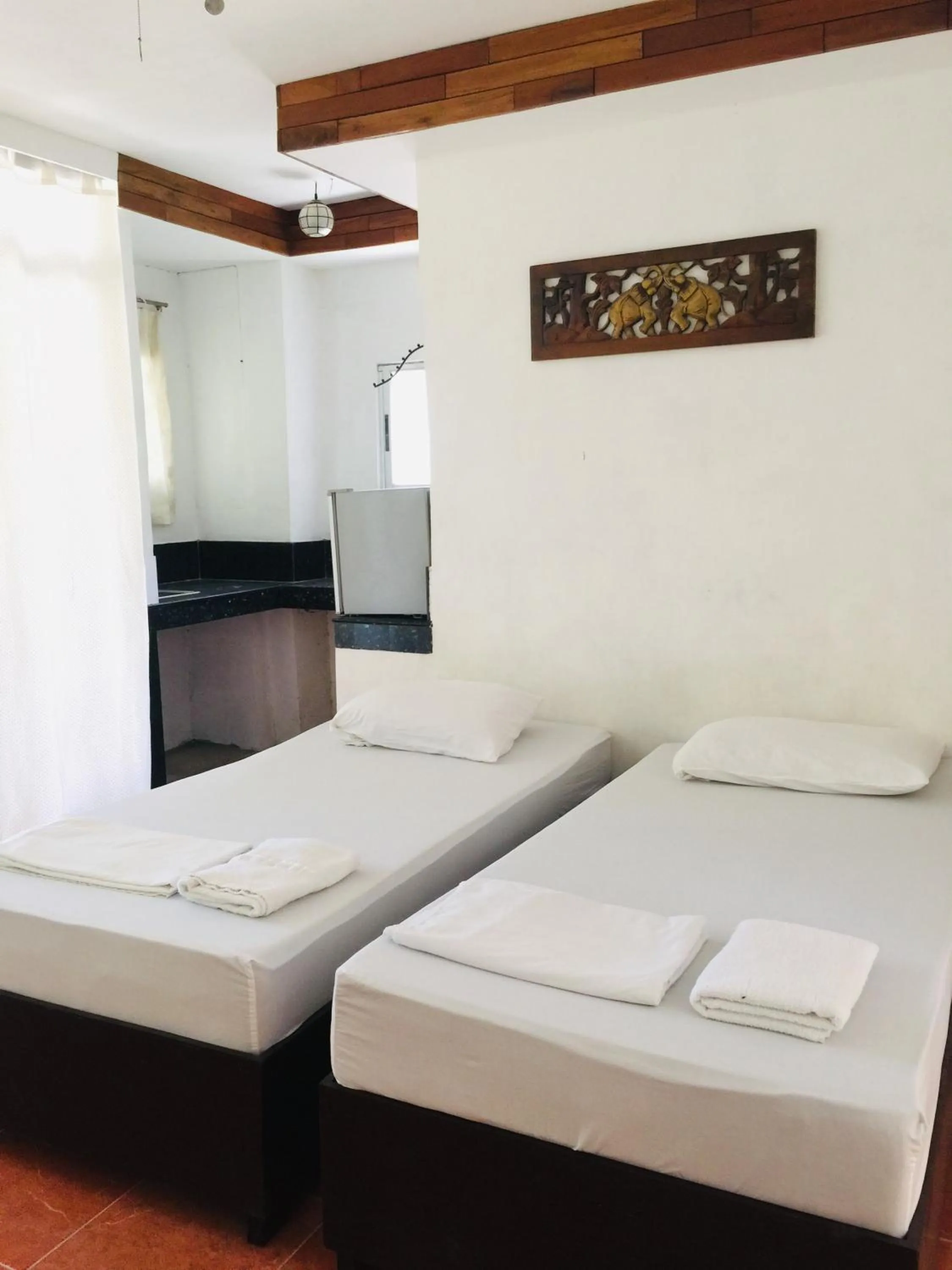 Bed in Boracay Ocean Bay Hotel