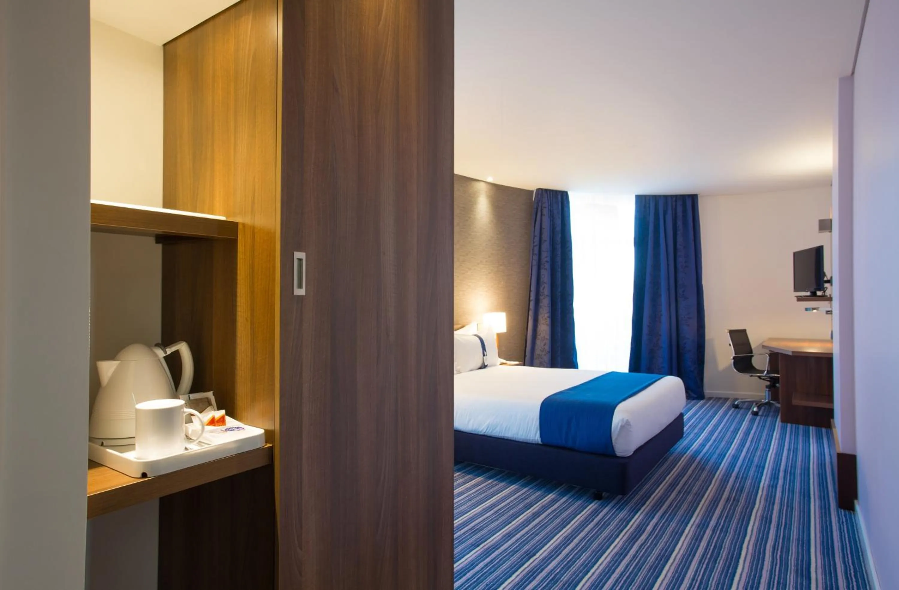 Photo of the whole room, Bed in Holiday Inn Express Lisboa - Av. Liberdade by IHG