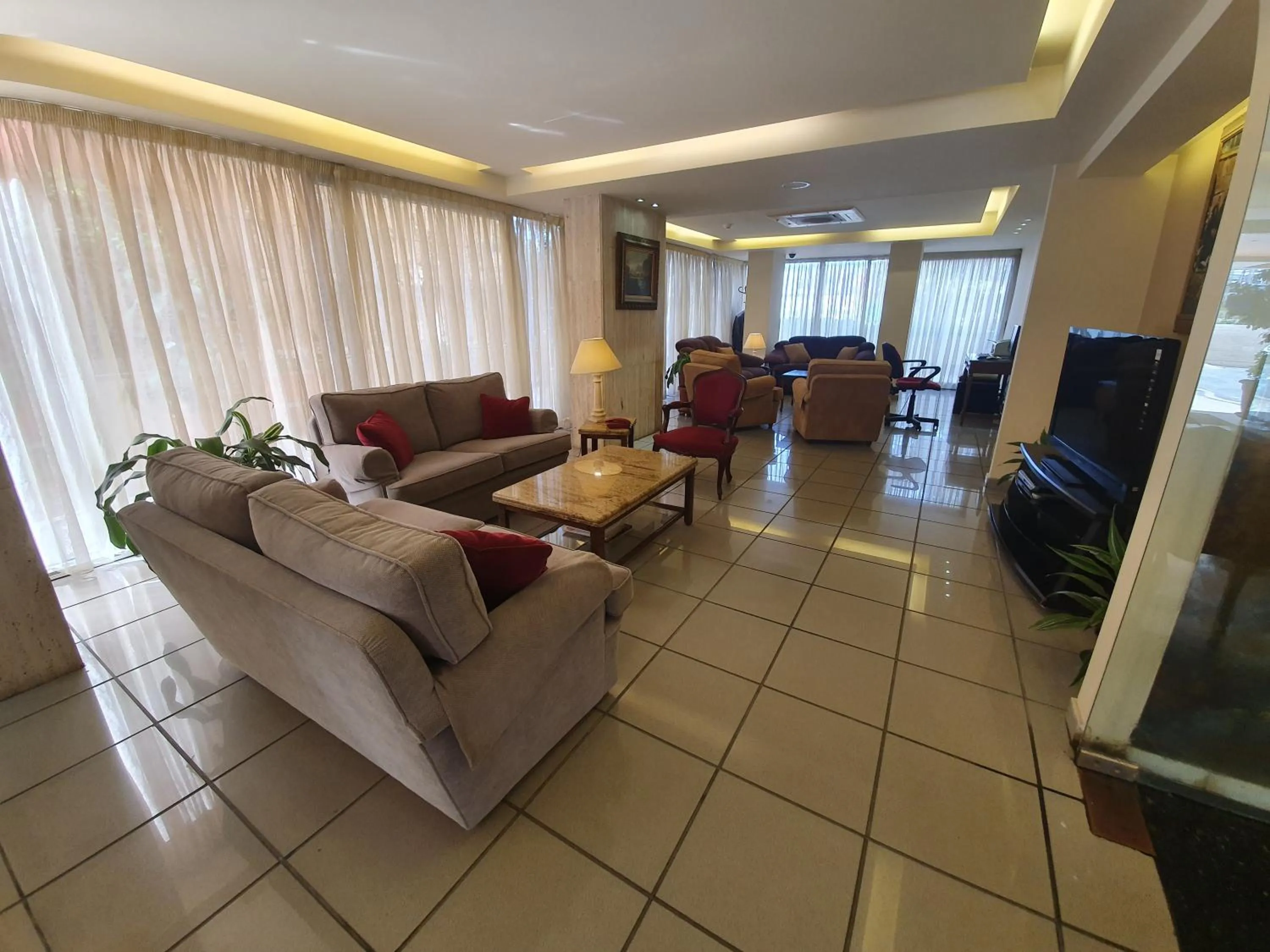 Lobby or reception in Holiday Home Suites