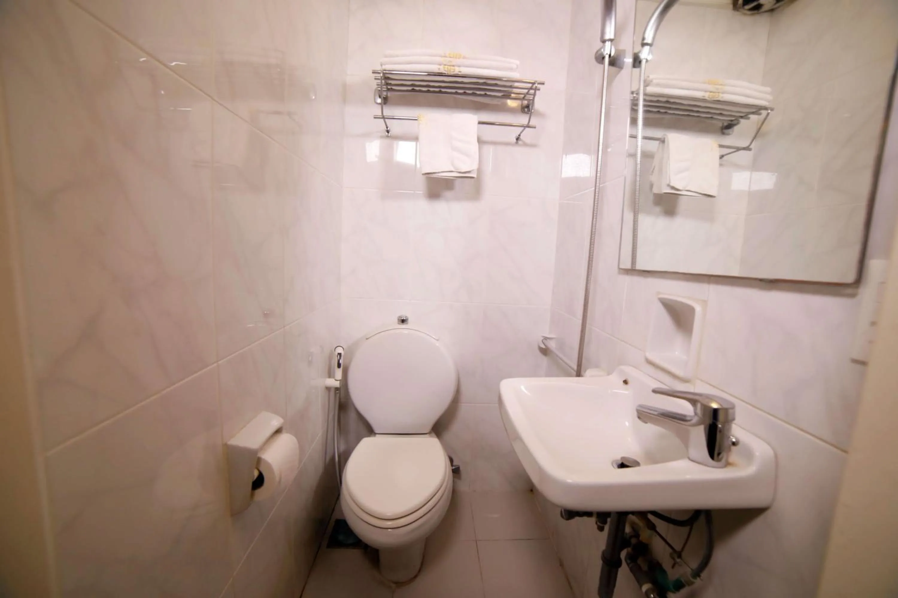 Toilet in Holiday Home Suites