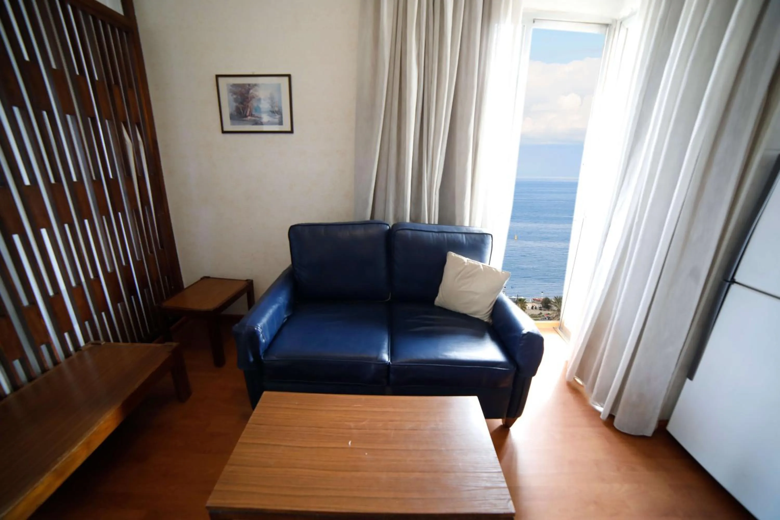 Seating area in Holiday Home Suites