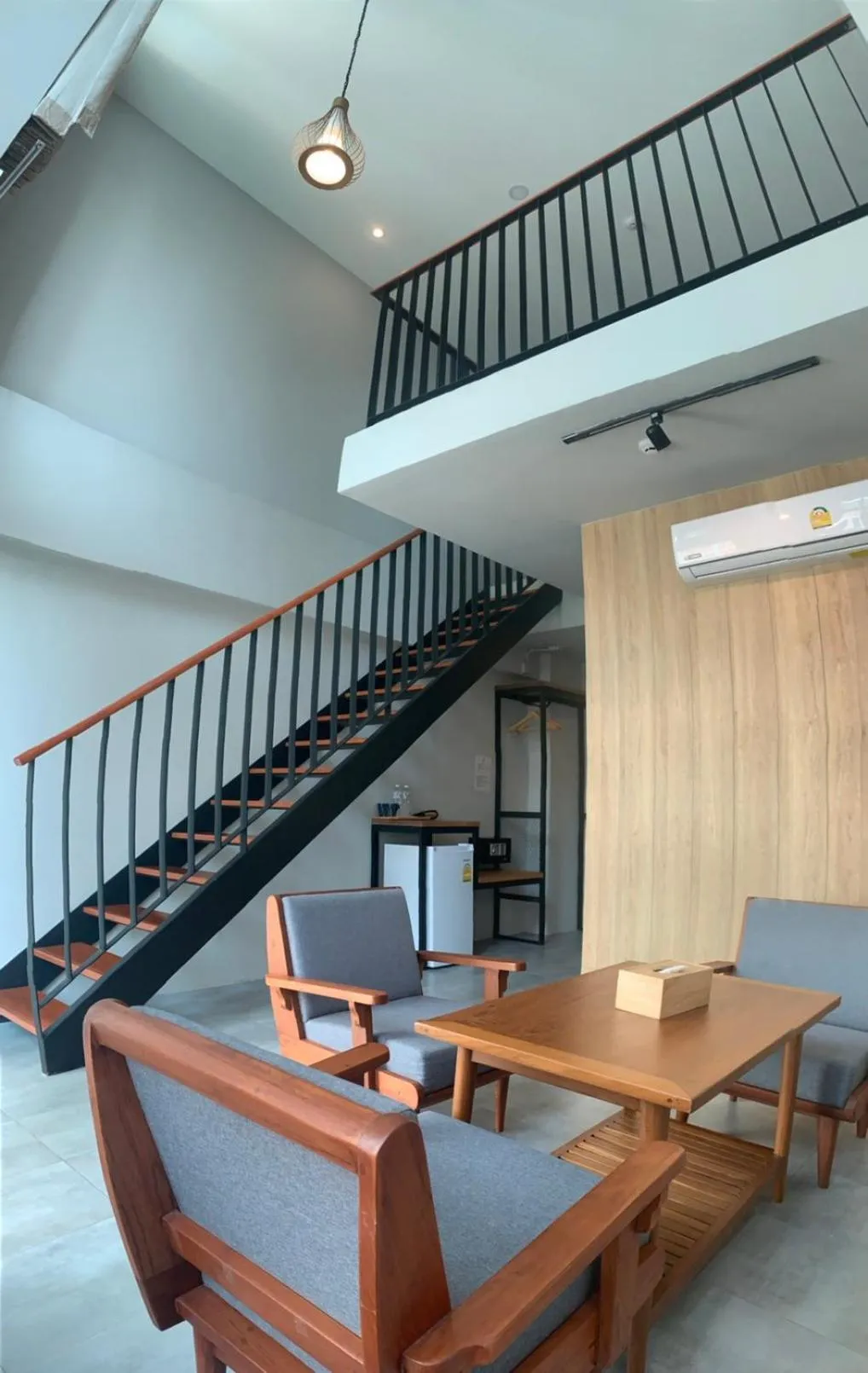 Living room in Atom Phuket Hotel