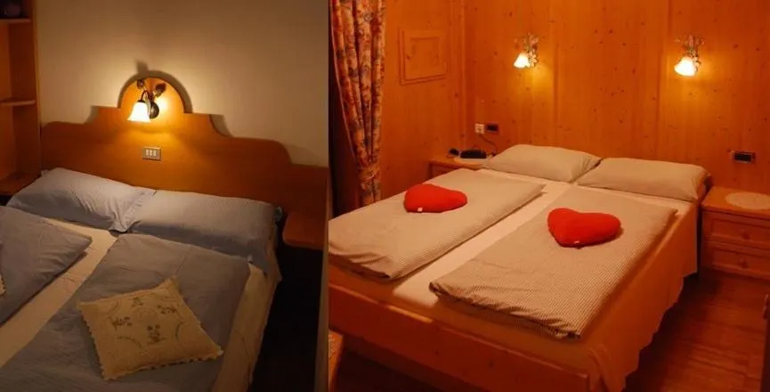 Bed in Albergo Genziana