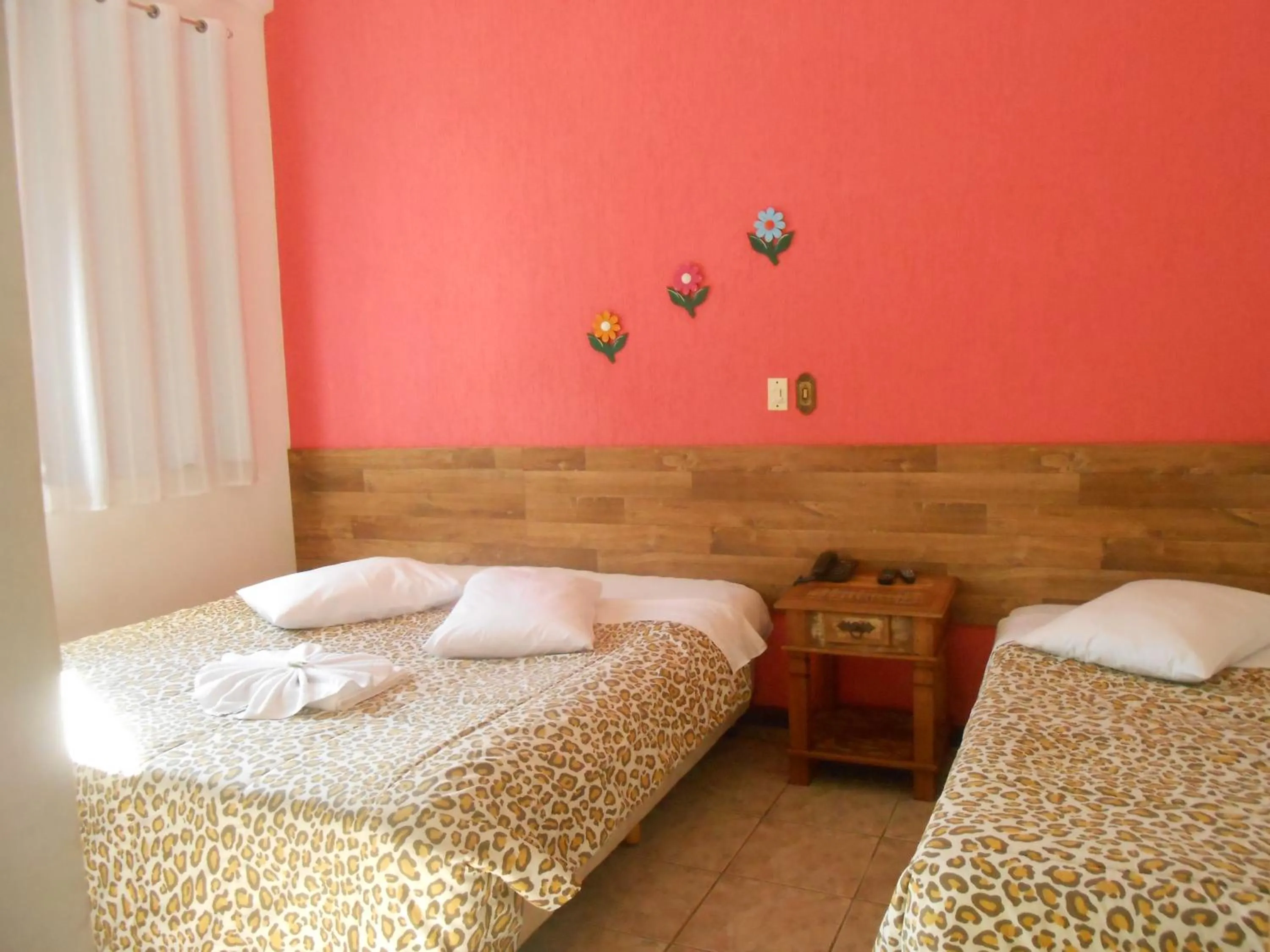 Bed in Pousada Aconchego de Minas