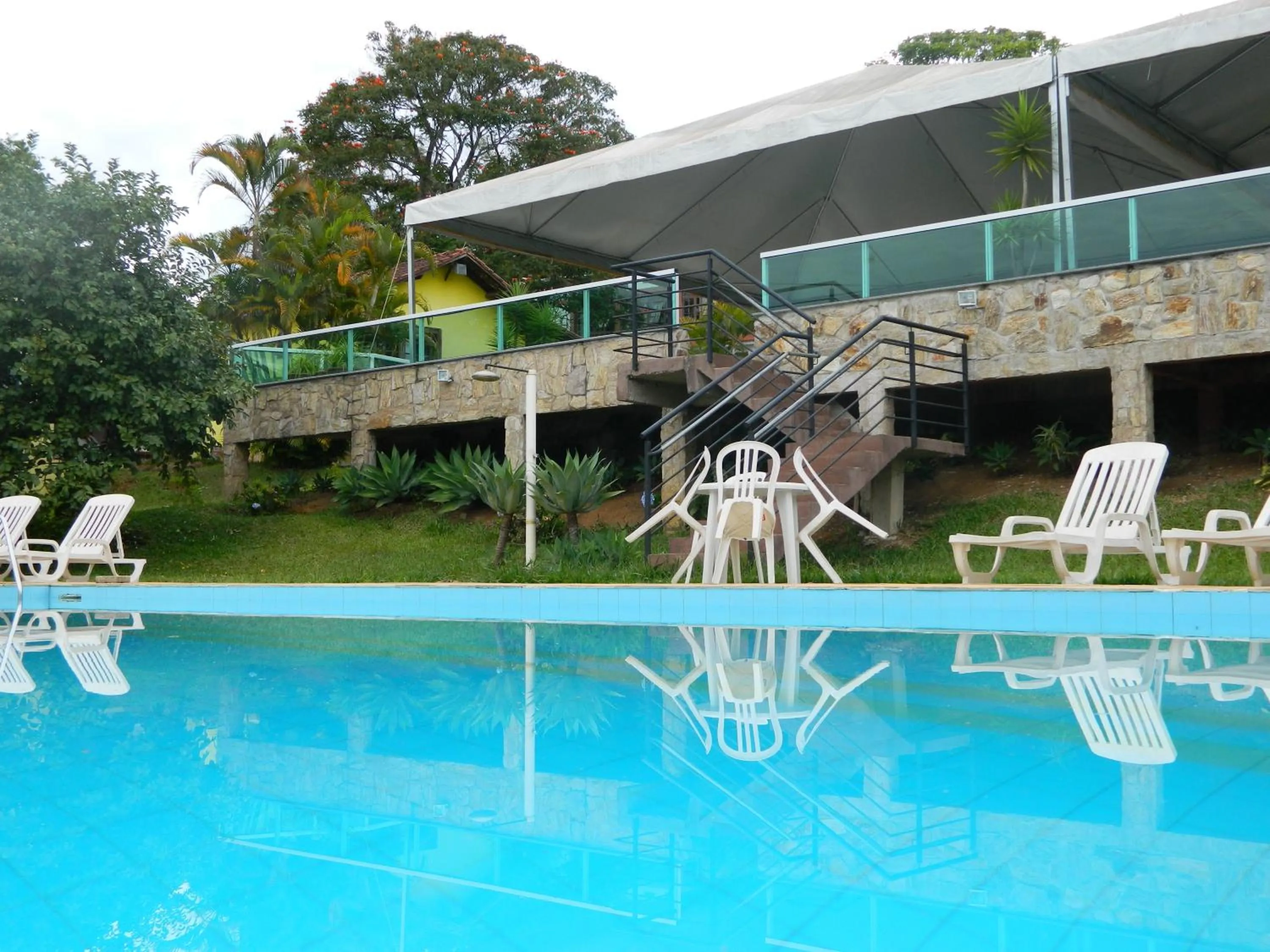 Swimming pool in Pousada Aconchego de Minas