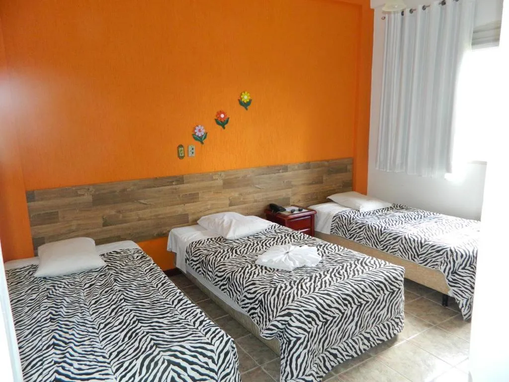 Bed in Pousada Aconchego de Minas