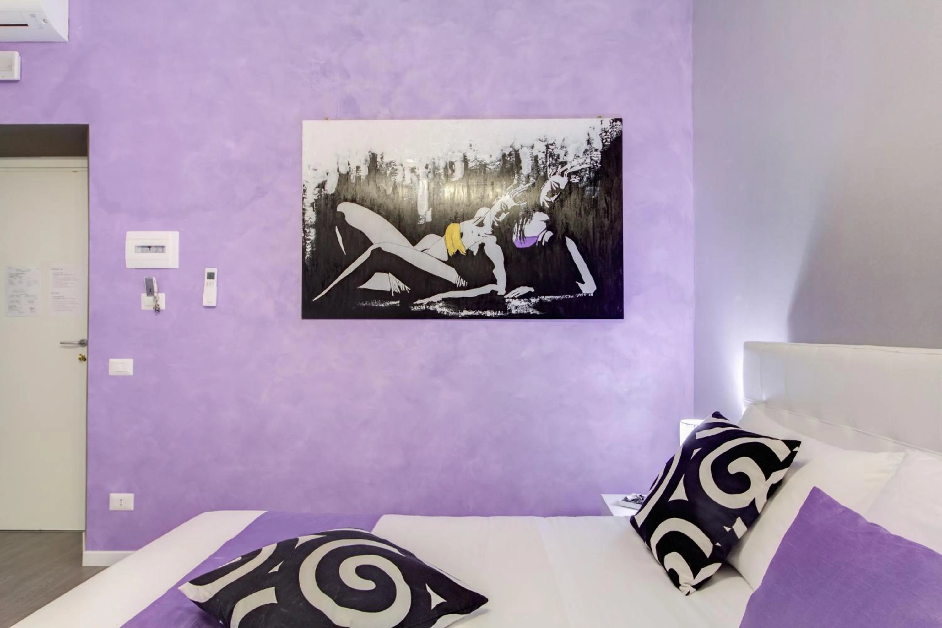 Bed in B&B Colosseo Panoramic Rooms