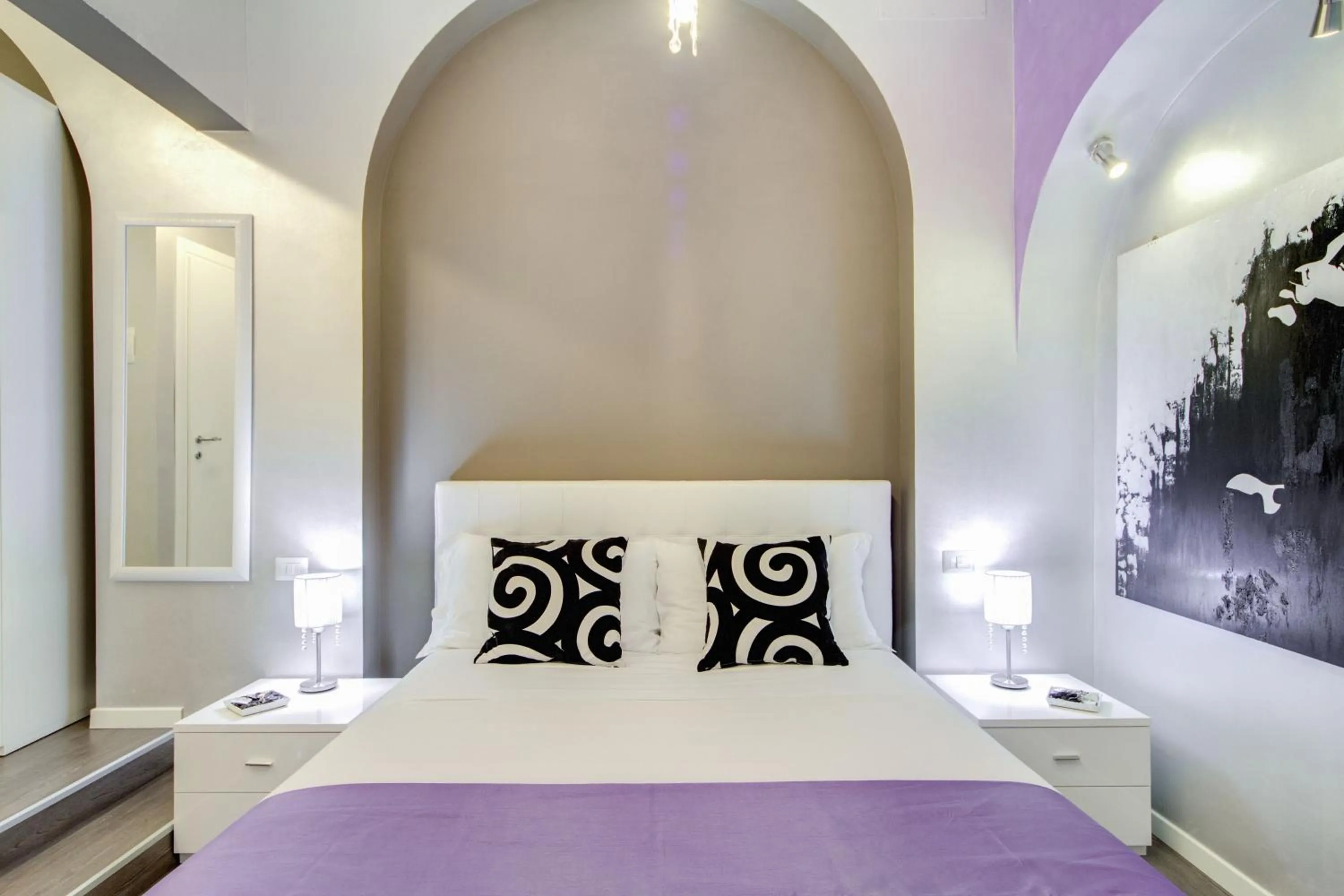 Bed in B&B Colosseo Panoramic Rooms