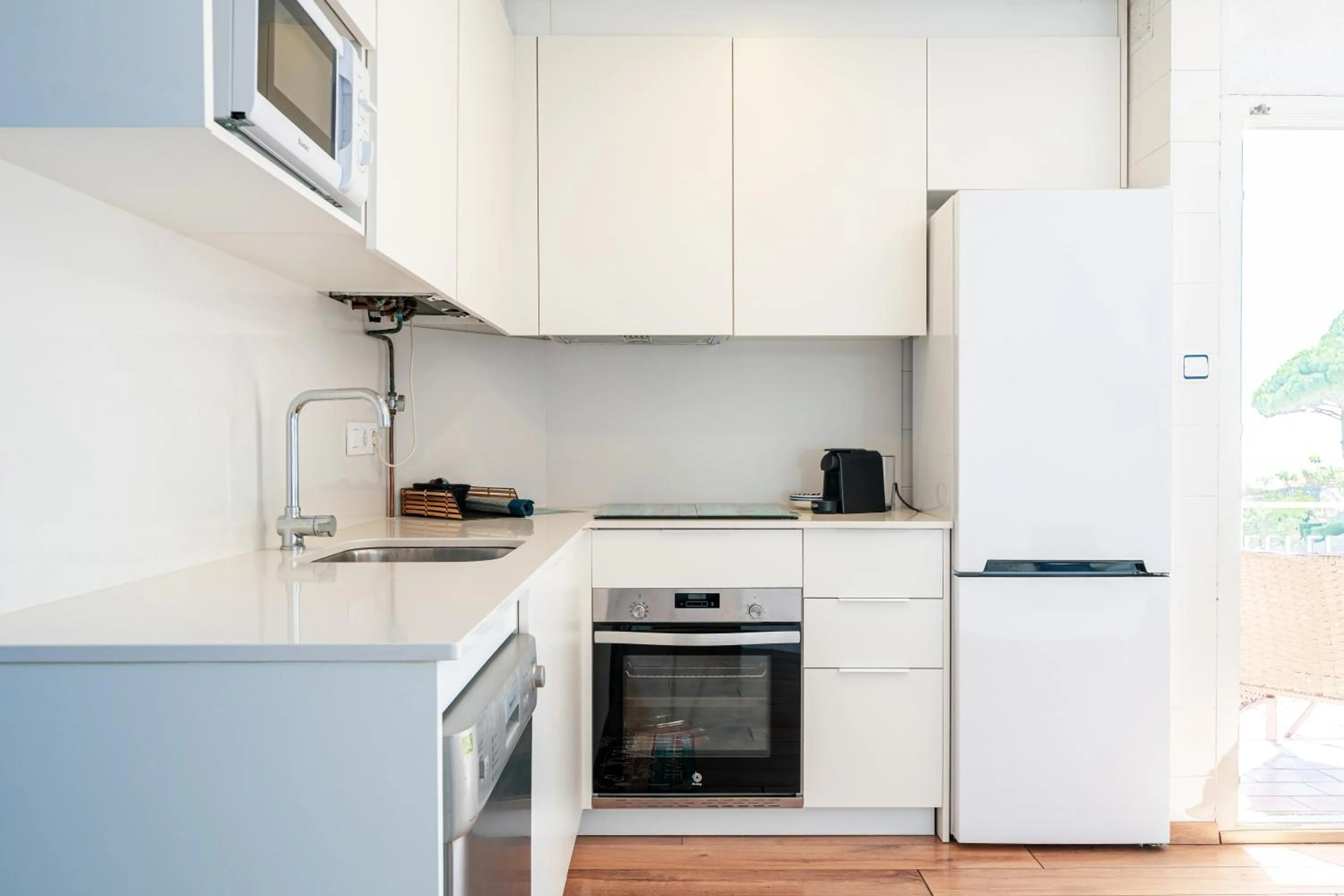 Kitchen or kitchenette in Santa Llucia Apartaments